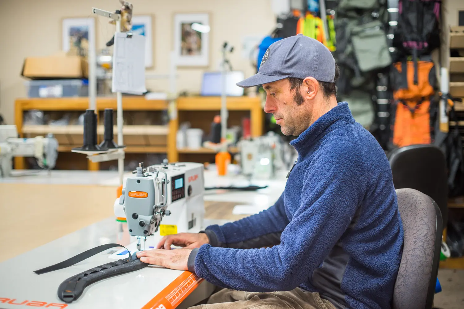 Pack master: Southern Lite Packs owner Luke Sergent at work in his Kingston workshop. Photo: Supplied