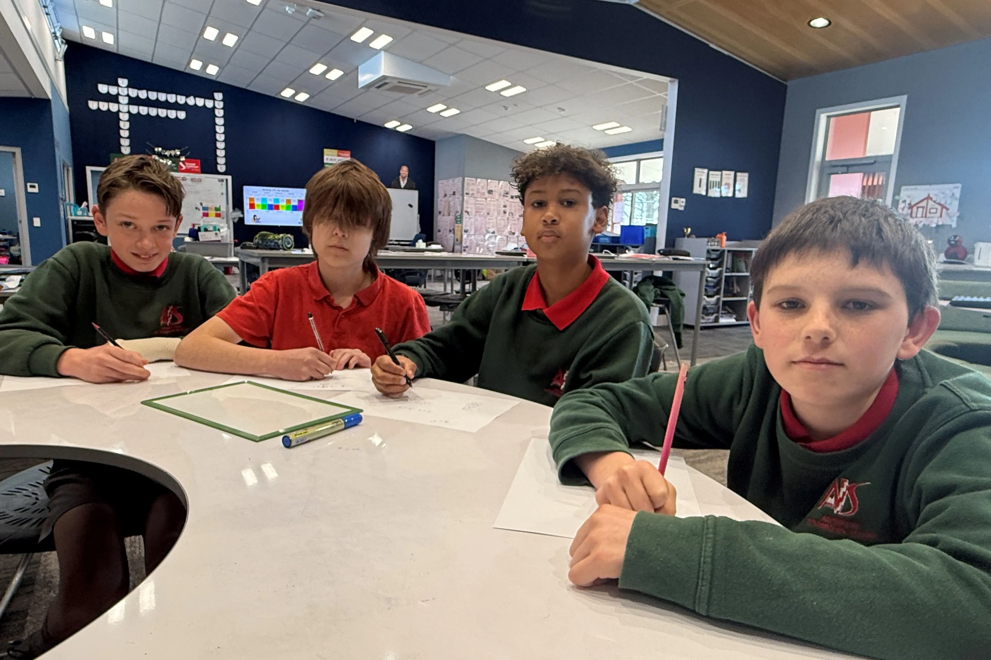 Math champions, from left, Leon Stephen, Isaac Davison, Brady Hunsley and David Scott return to class after winning the Year 8 Aoraki Maths Competition in Timaru. Photo: Supplied