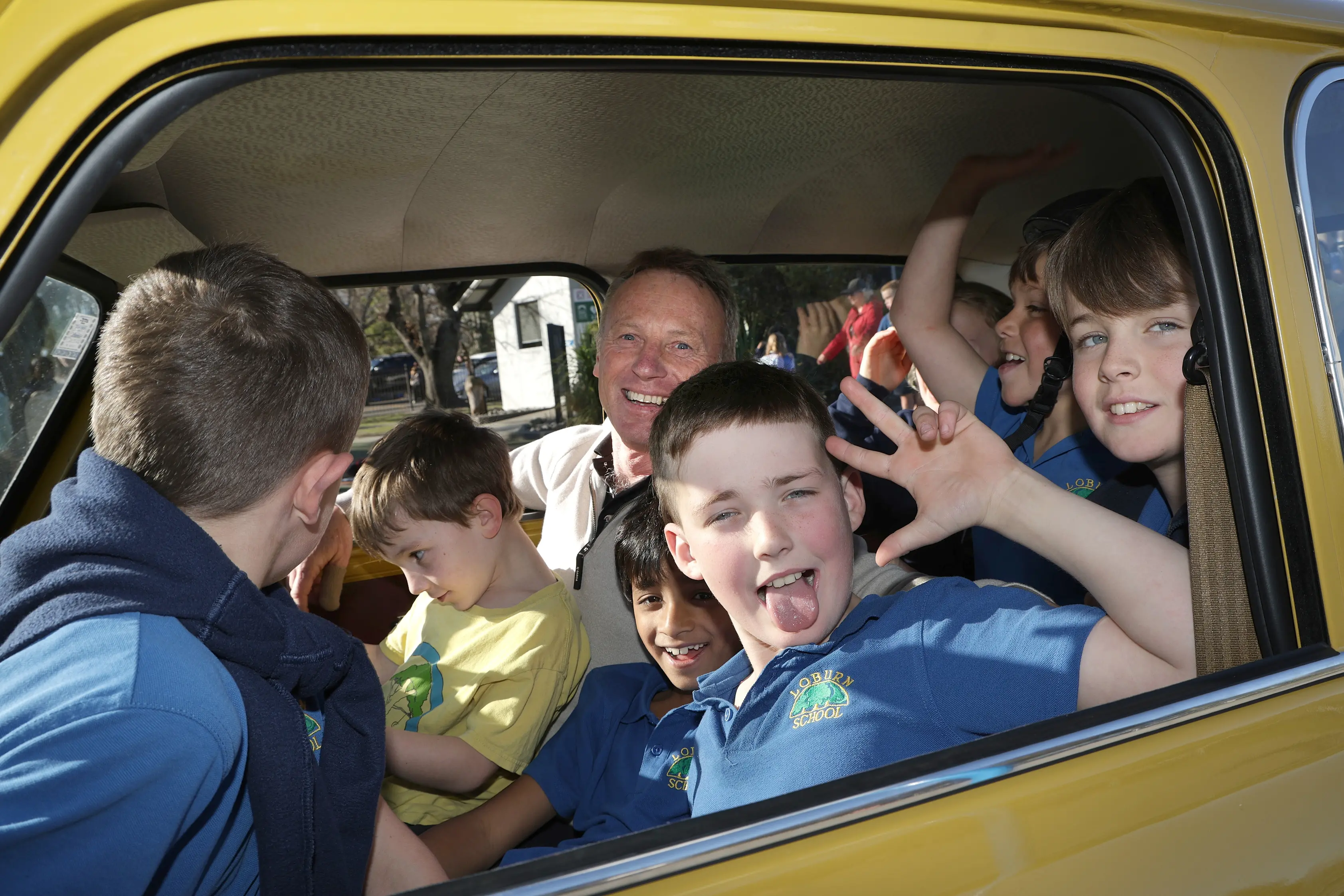 Stuffing them all in . . . Loburn School Principal Stuart Priddy sits inside an Austin Mini car packed full of children from Loburn School who took part in a fun Mini stuffing contest to see how many children could fit into the tiny car. With Mr Priddy are Calvin Dijkstra, George Chandy, Boston O\\'Connell and Brax Fairhall. Photo: John Cosgrove