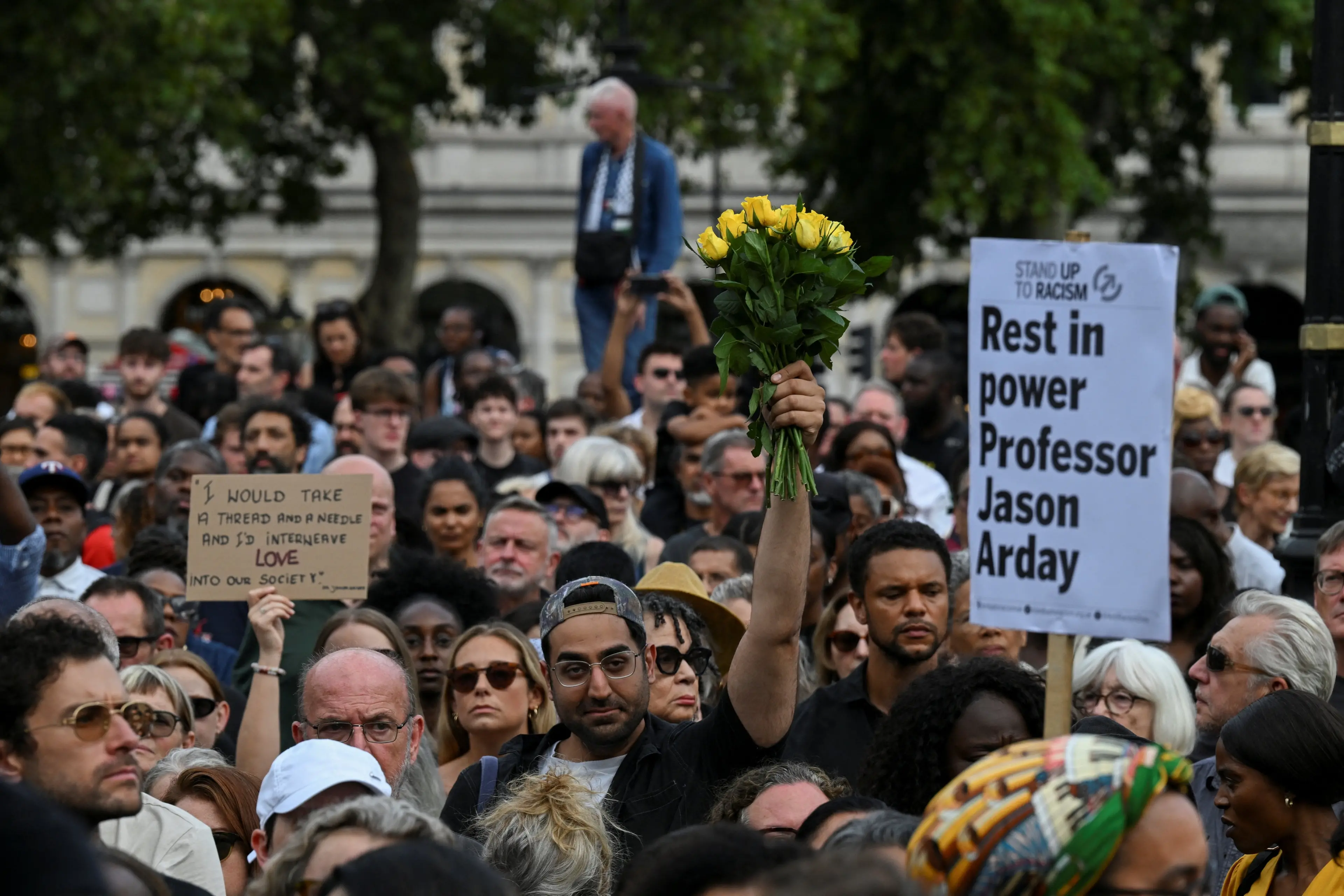 People attend a vigil at Trafalgar Square to remember former Cambridge professor Jason Arday. Photo: Reuters