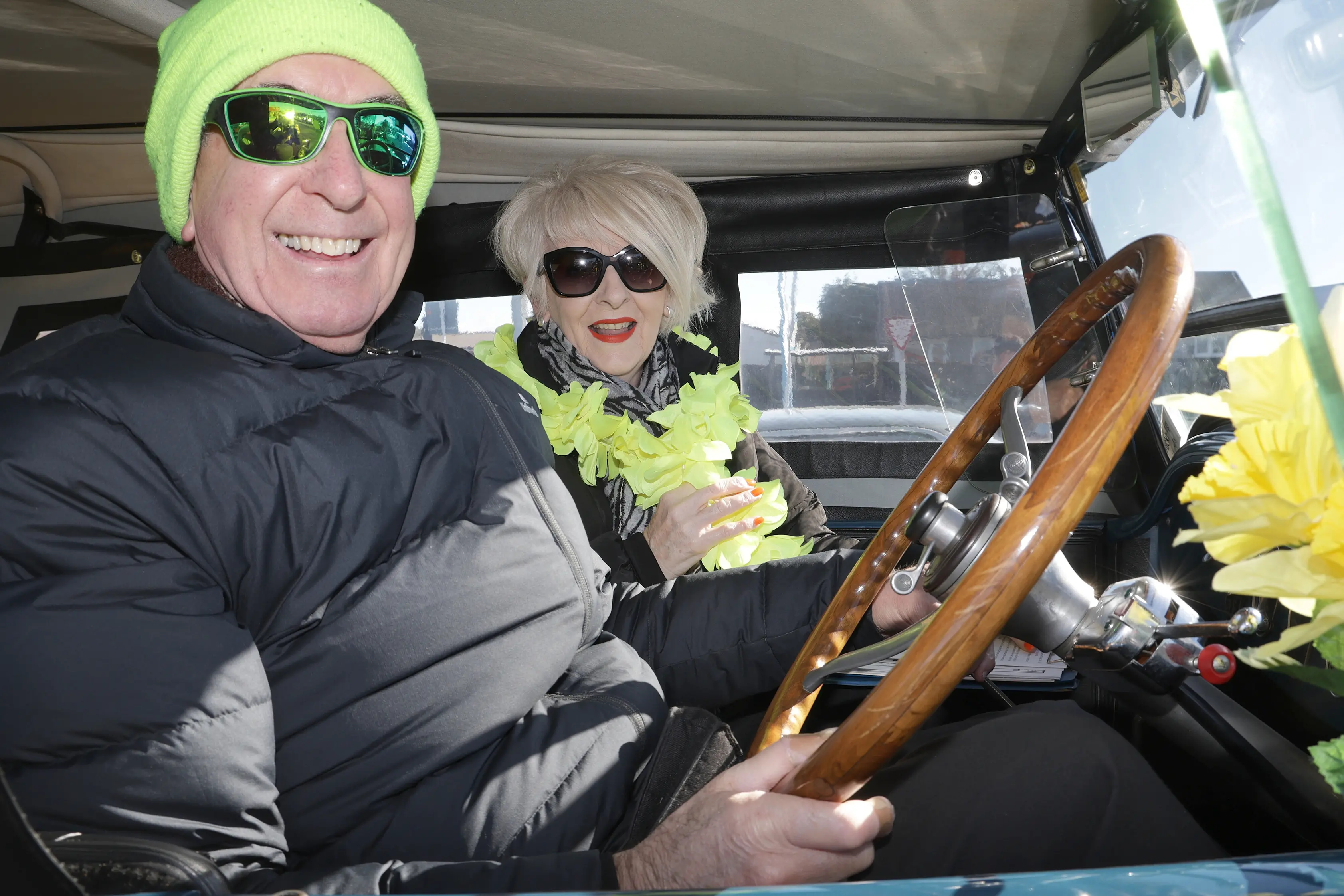 Dressed for the day . . . Decked out in yellow were Murray and Kerrie Trounson of Kaiapoi, who drove to the Daffodil Day car rally in style behind the wheel of a 1926 Buick Master Six Tourer four-door sedan, which they have owned and restored since 1980. Photo: John Cosgrove
