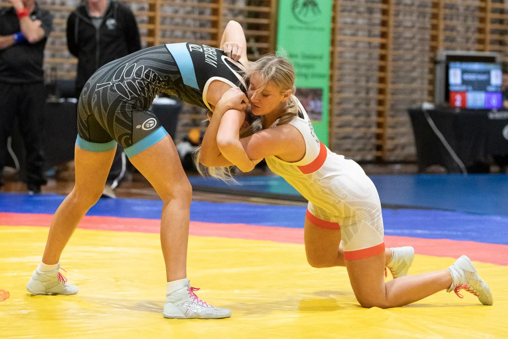 Sienna Forgie (right) has blazed a trail in wrestling at Taieri College. Photo: Supplied