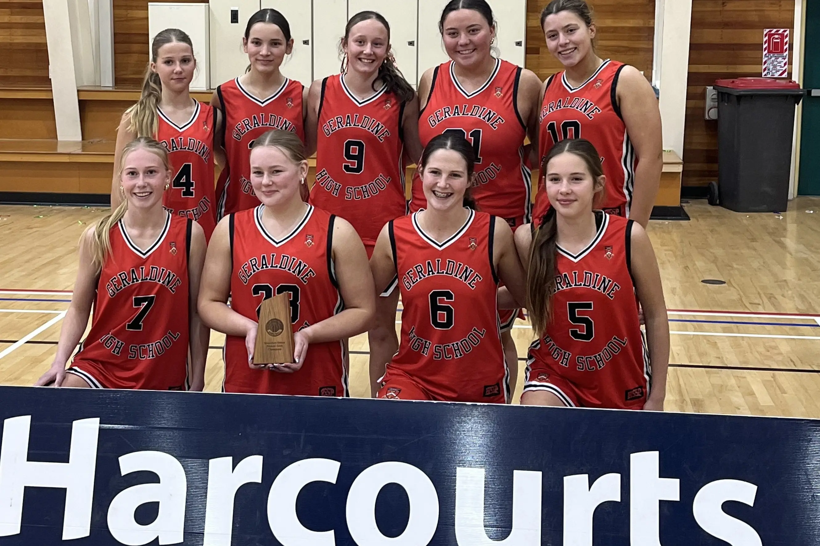 Geraldine High Schools\\u2019 Senior A girls\\u2019 basketball team celebrating taking the top spot are (back row, from left)\\u00A0Libby Cooper (13), Summer Snow (18), Ruby Oliver (14), Georaeah Edmonds Cooper (18), Milly Chapman (17), and (front row) Sophia Rusbridge (17), Emily Muff (18), Maddi Cooper (16) and Charlee Cooper (14). Photo: Supplied