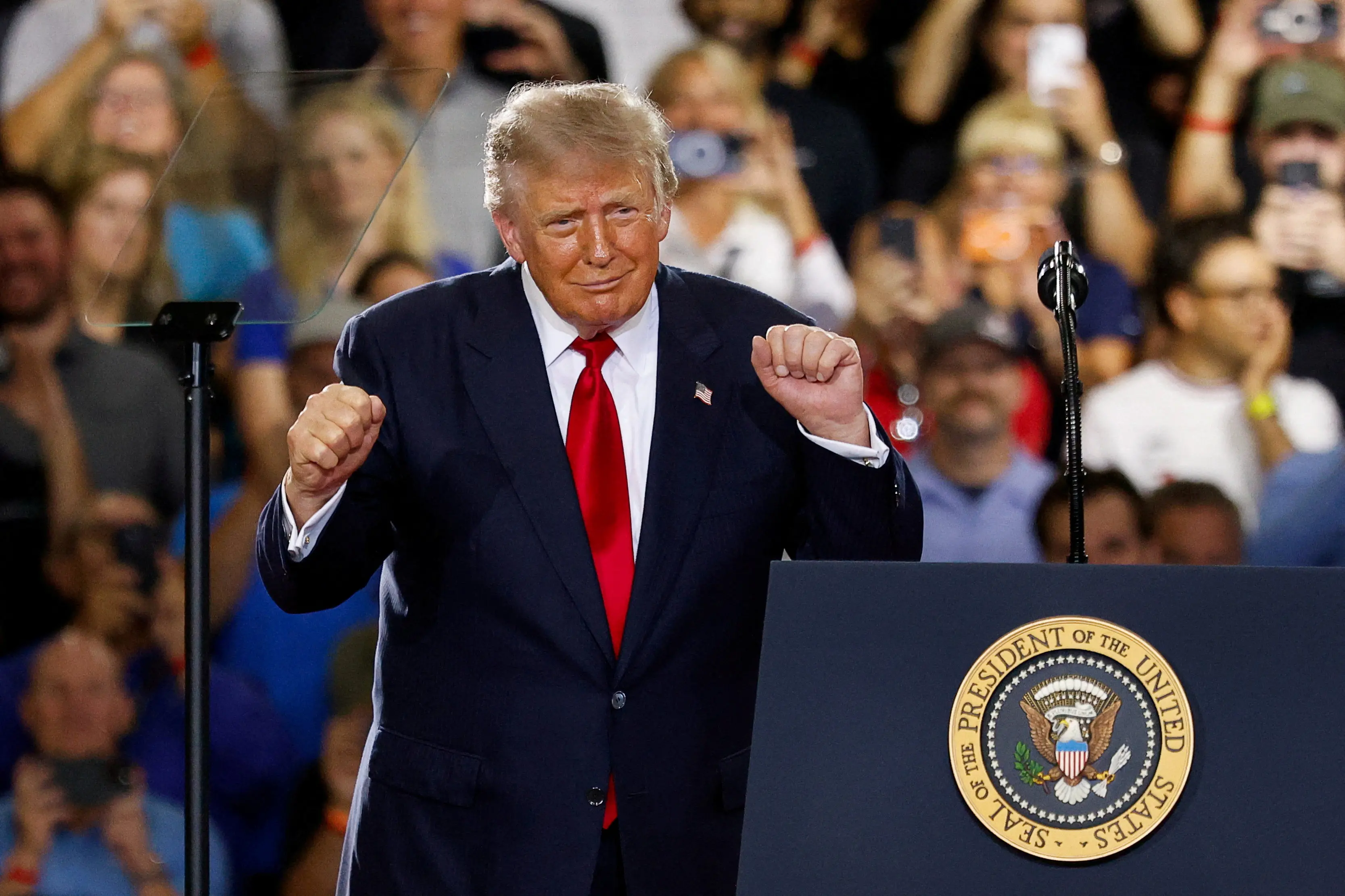 <p>US&nbsp;President Donald Trump dances&nbsp;as he delivers remarks on the economy in Michigan. Photo: Reuters</p>\\n