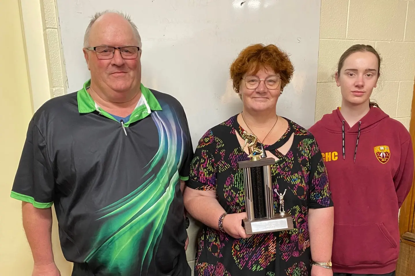 Ken, Rowena and Taylor Mackenzie with the Hallenstein Trophy after winning South Canterbury Triples Championship on Saturday. Photo: Supplied
