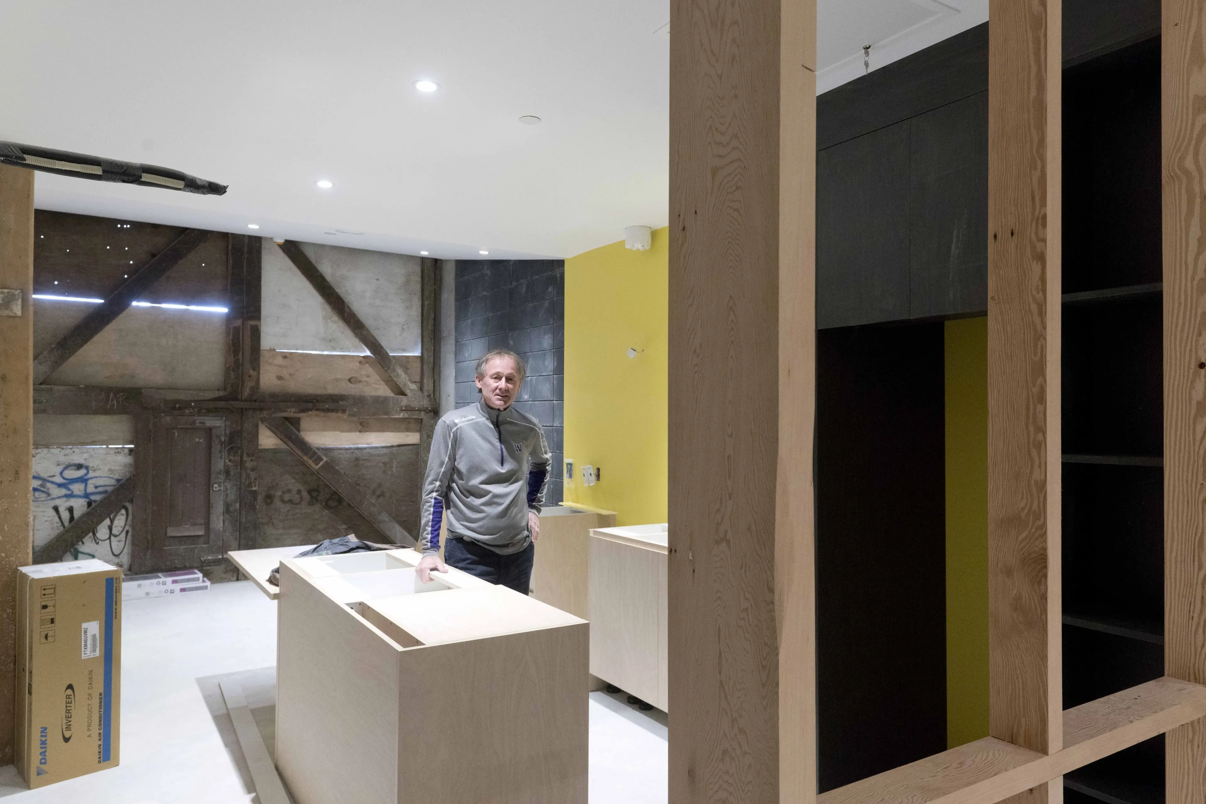 Developer Russell Lund keeps an eye on progress in one of the new social housing units being created in the former Loan and Mercantile building in Dunedin. Photo: Gerard O\\'Brien