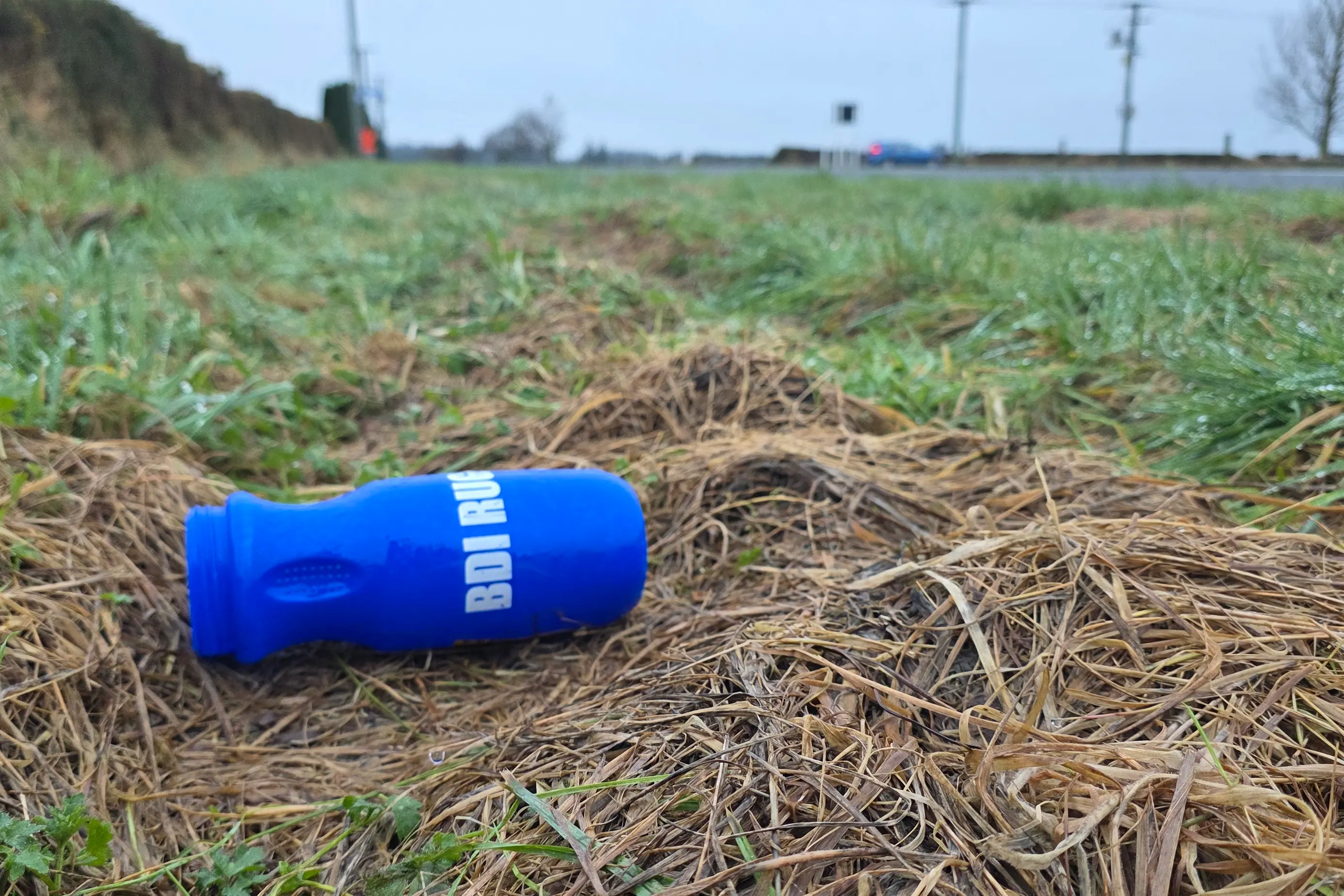 A BDI Rugby Club drink bottle near the scene of the crash. Photo: Daniel Alvey