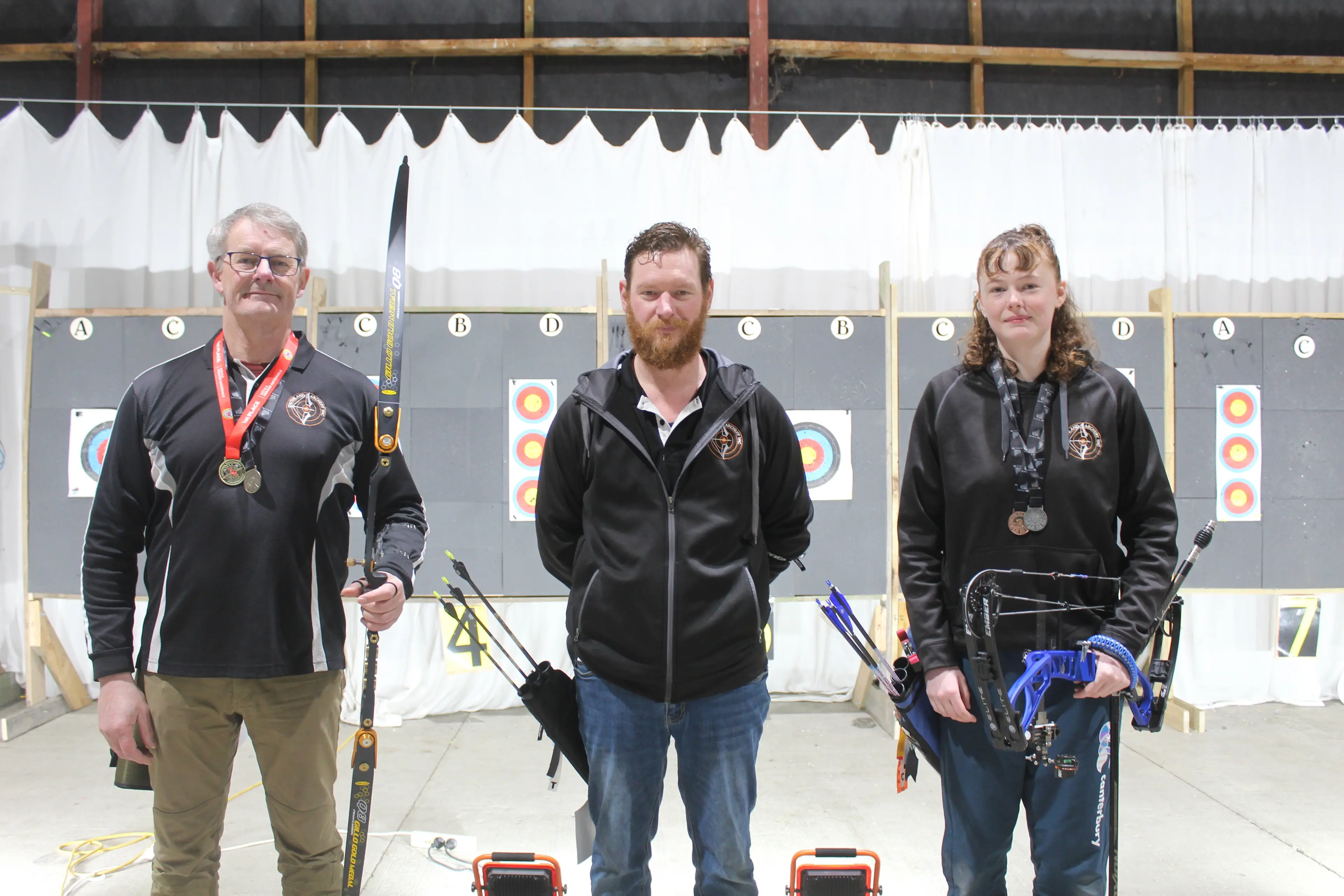 Southland Archery Club members (from left) Paul Riley, Sian Cooper and Tegan Kennedy have all found success at a recent national archery tournament. Photo: Tayler Mutton