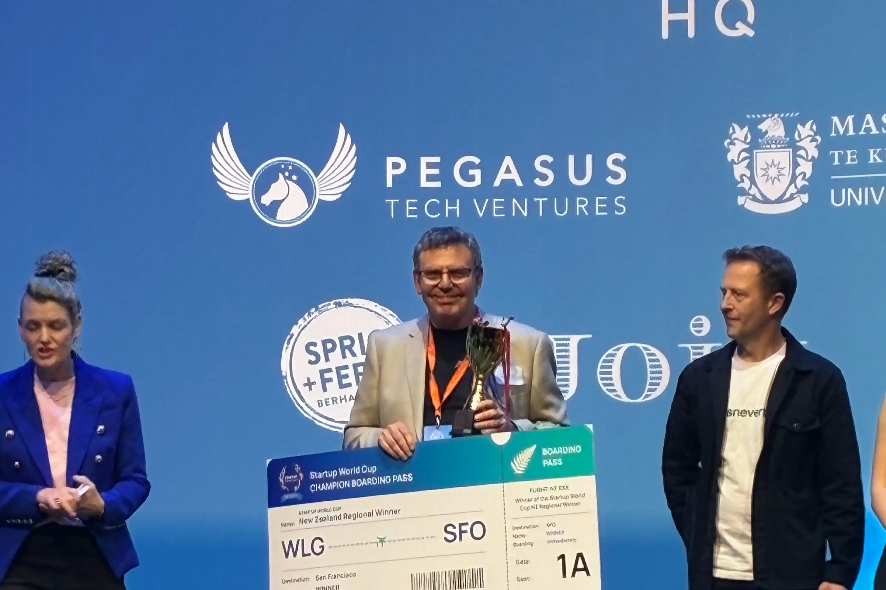 Neumic Therapeutics co-founder Prof John Reynolds holds a \"boarding pass\" to Silicon Valley. Photo: Supplied