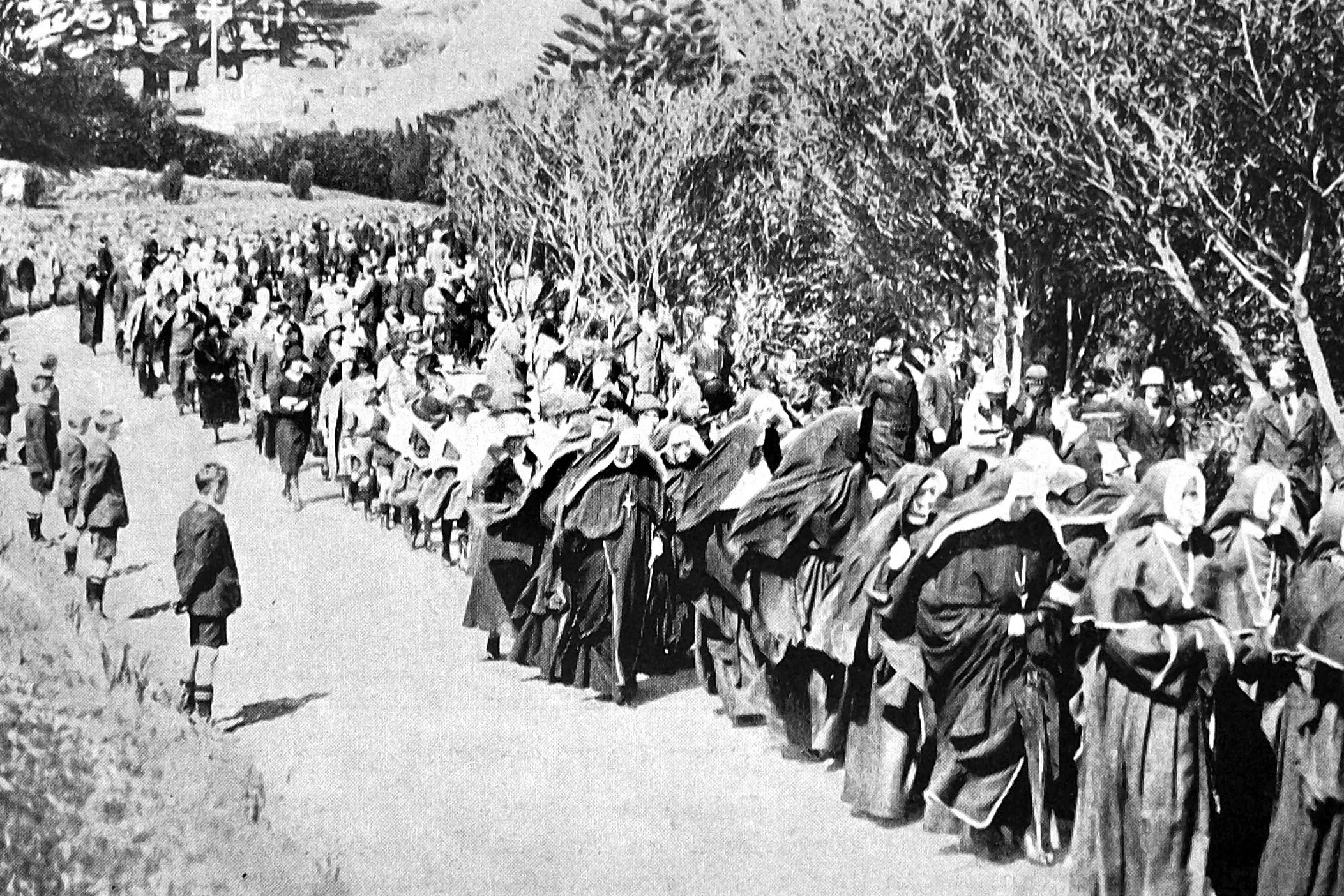 Sisters of Compassion nuns, children from the Home of Compassion and other mourners form a funeral procession for Suzanne Aubert the Very Rev Mother Mary Joseph at Wellington \\u2014 at the time reported to be the largest funeral ever accorded a woman in New Zealand. Photo: <i>Otago Witness</i>, issue 3787, October 19, 1926, page 41