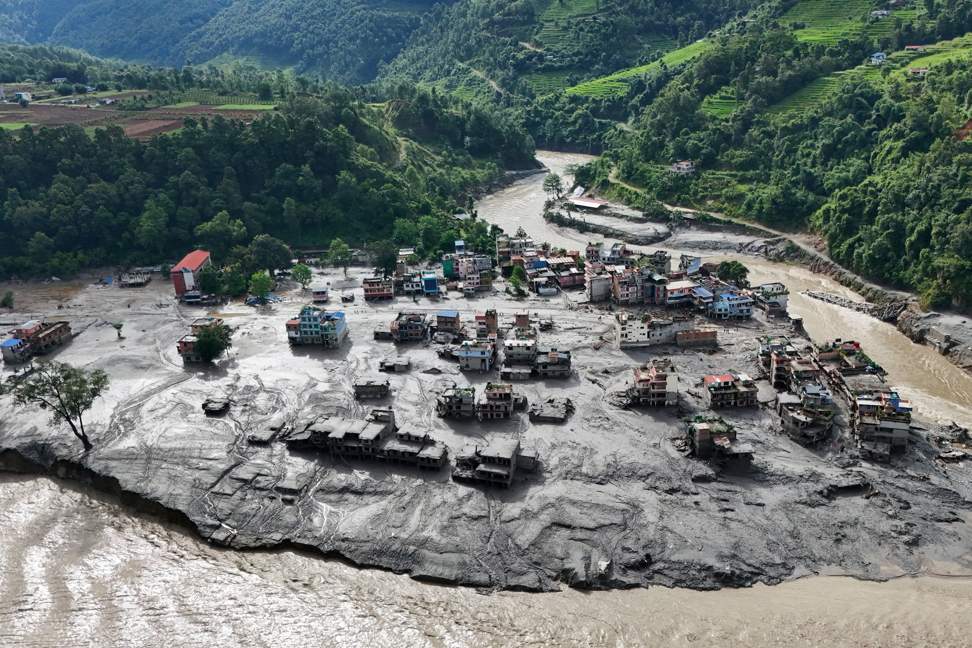 A drone view shows mud covering buildings and property following flooding at Trishuli in the Nuwakot district of Nepal. Photo: Reuters