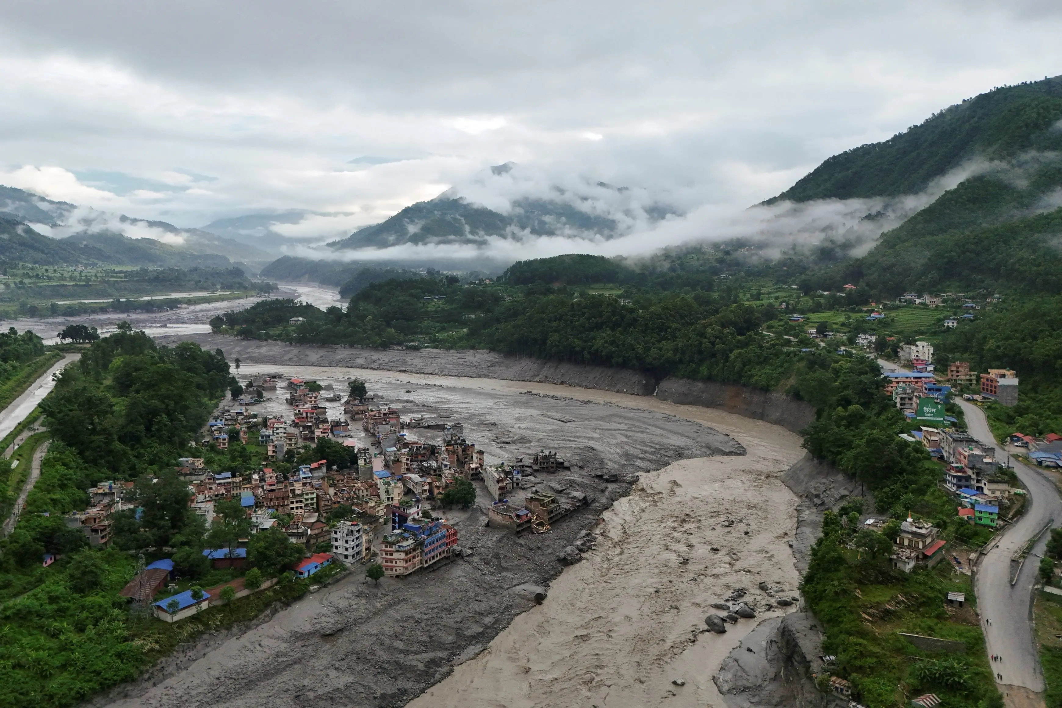 A drone view shows mud covering properties following a flash flood in Trishuli, Nuwakot district, Nepal, on Thursday. Photo: Reuters