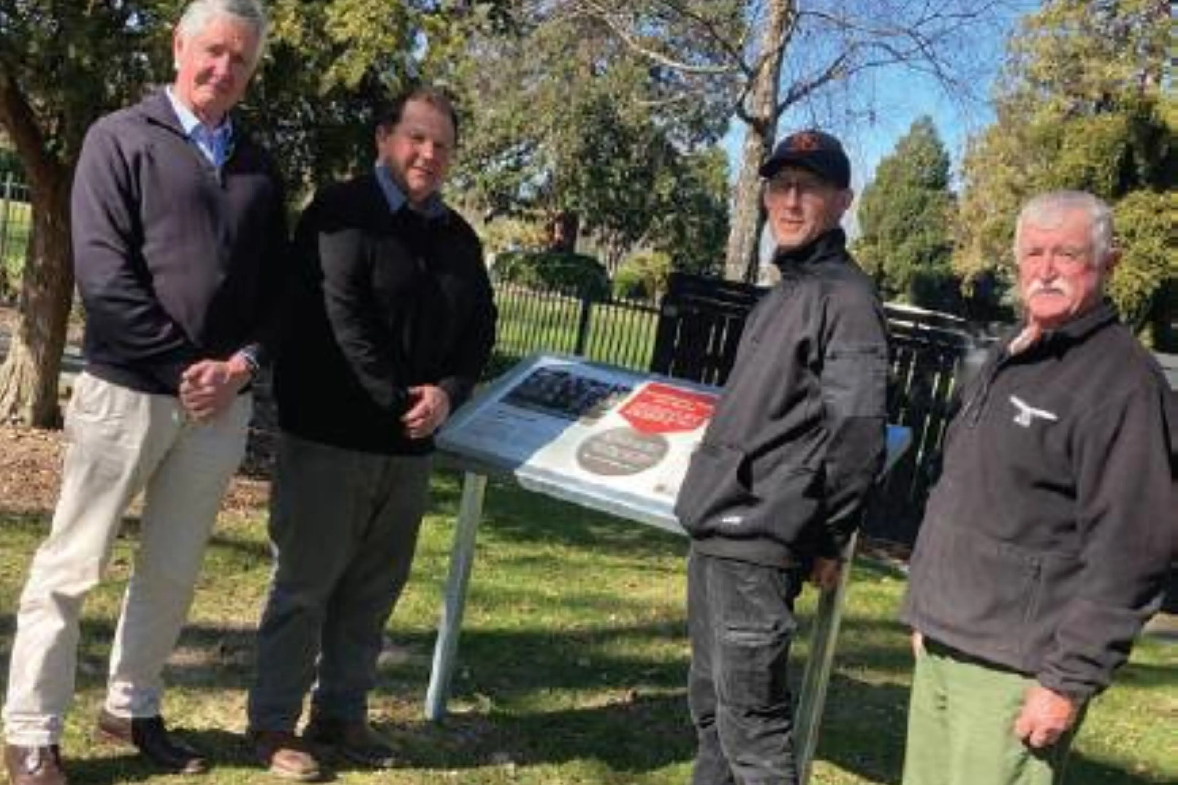 With the newly installed commemorative panel, from left, Geraldine Ward Councillor Philip Harper, Geraldine Community Board chair Andy McKay, Brand Boost Solutions owner and operator Mark Brown, and Geraldine RSA president John Bray. Photo: Jan Finlayson