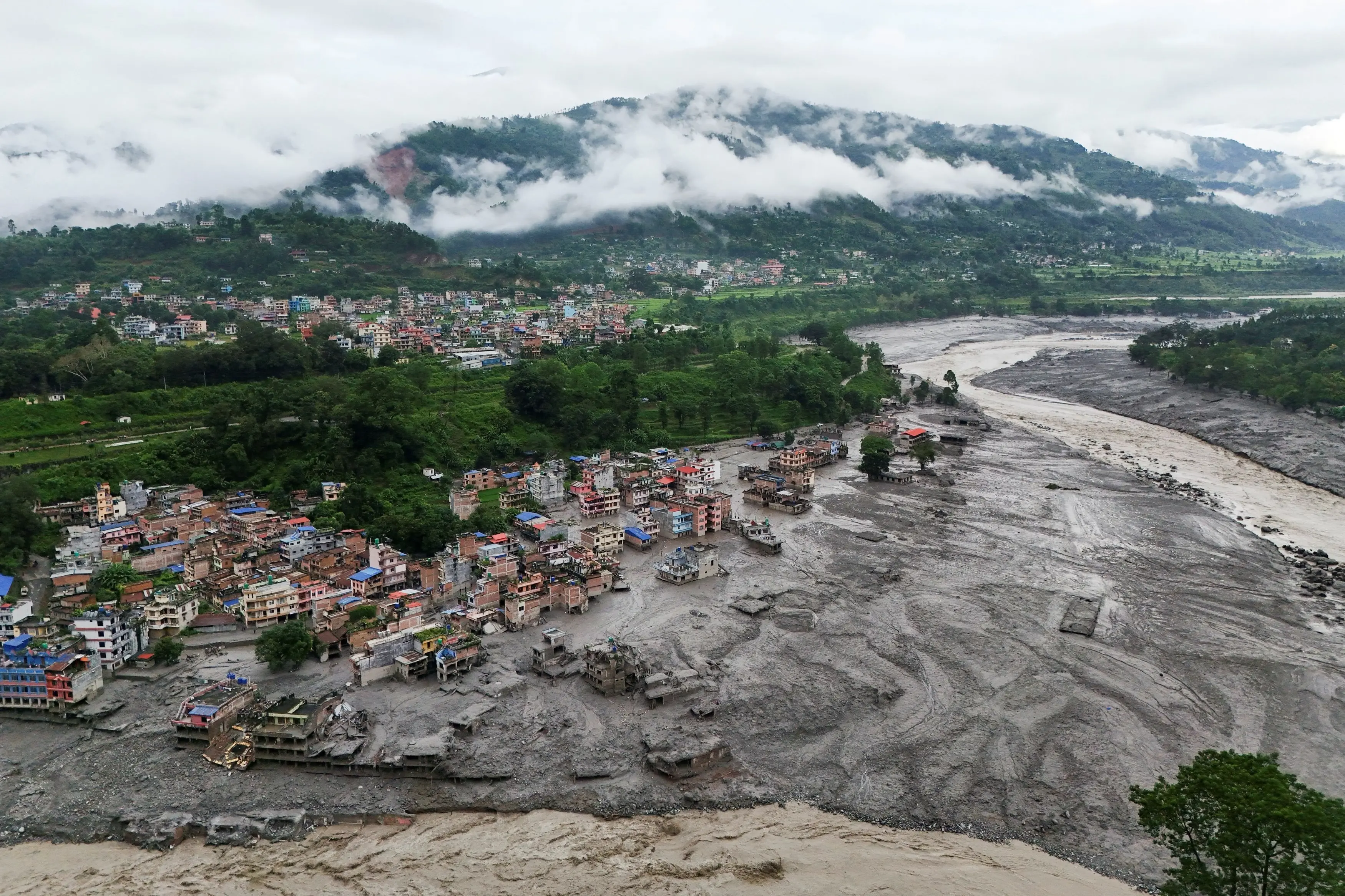 A drone view shows mud covering properties following a flash flood in Trishuli, Nuwakot district, Nepal. Photo: Reuters
