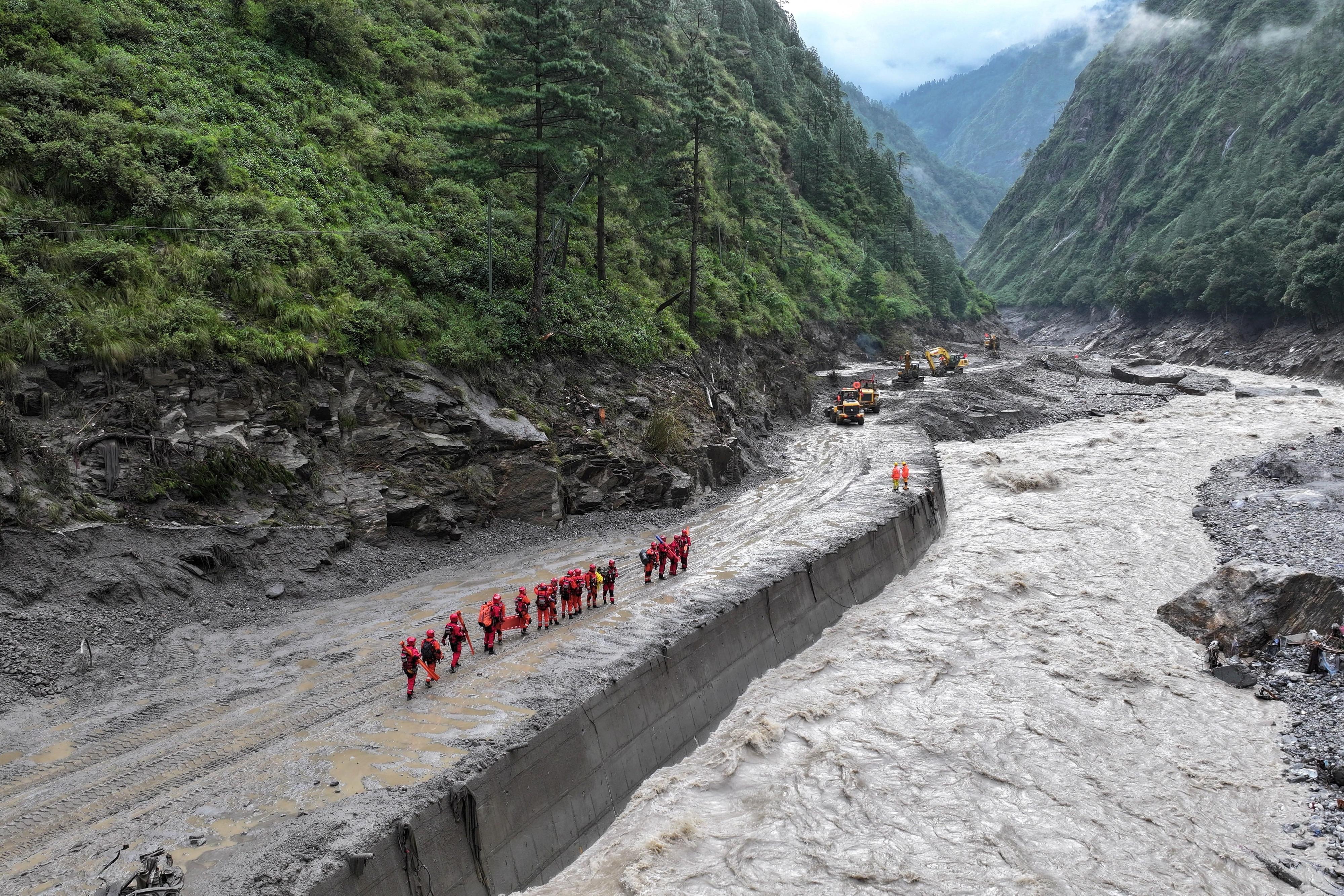 Chinese rescue team finds 'nothing but ruins' at flood-hit Himalayan border crossing