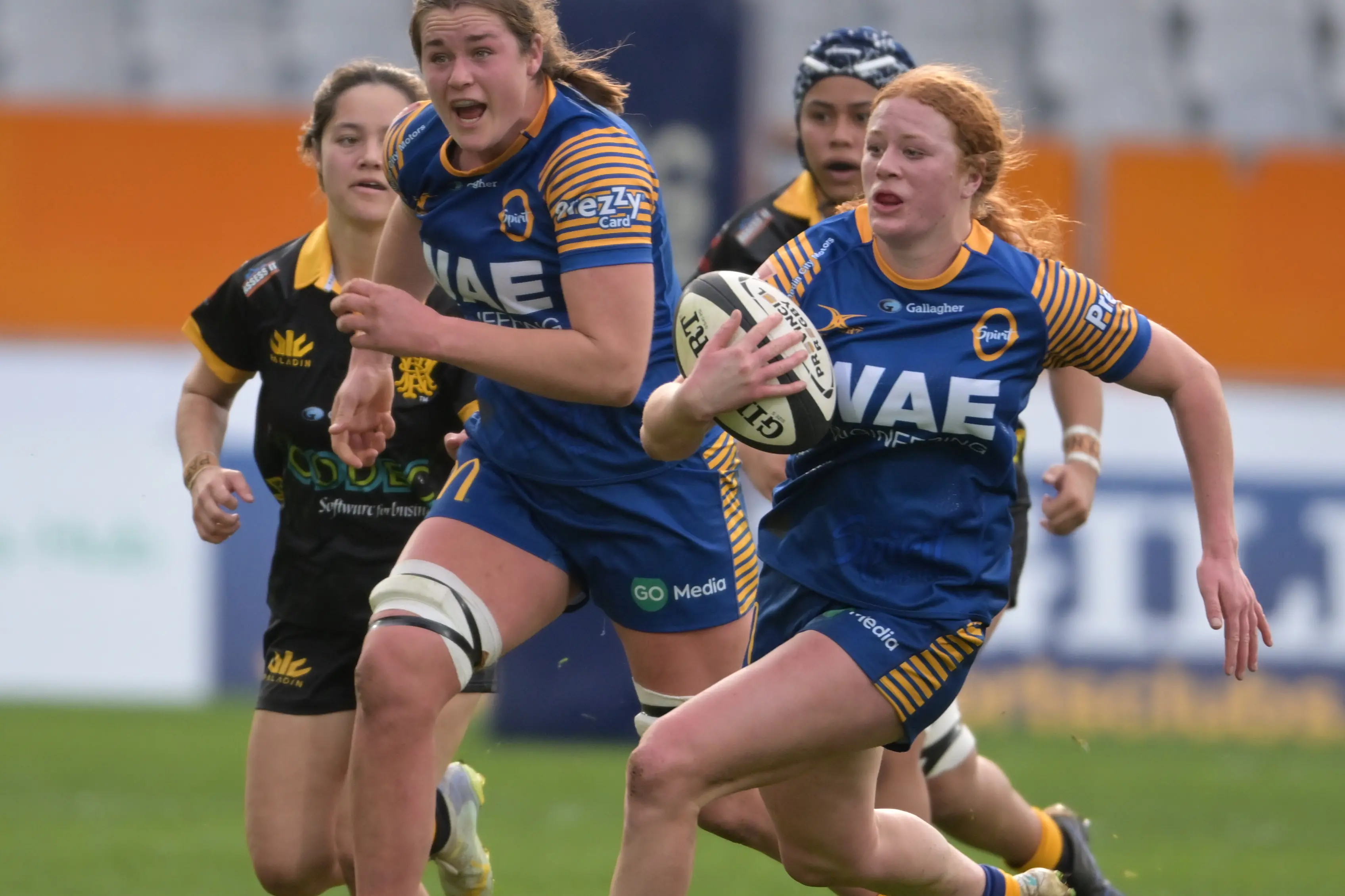 Otago winger Zaria Murray makes a break with team-mate Ella Gomez in support during a Farah Palmer Cup game against Wellington at Forsyth Barr Stadium on Saturday. Photo: Gerard O\\'Brien