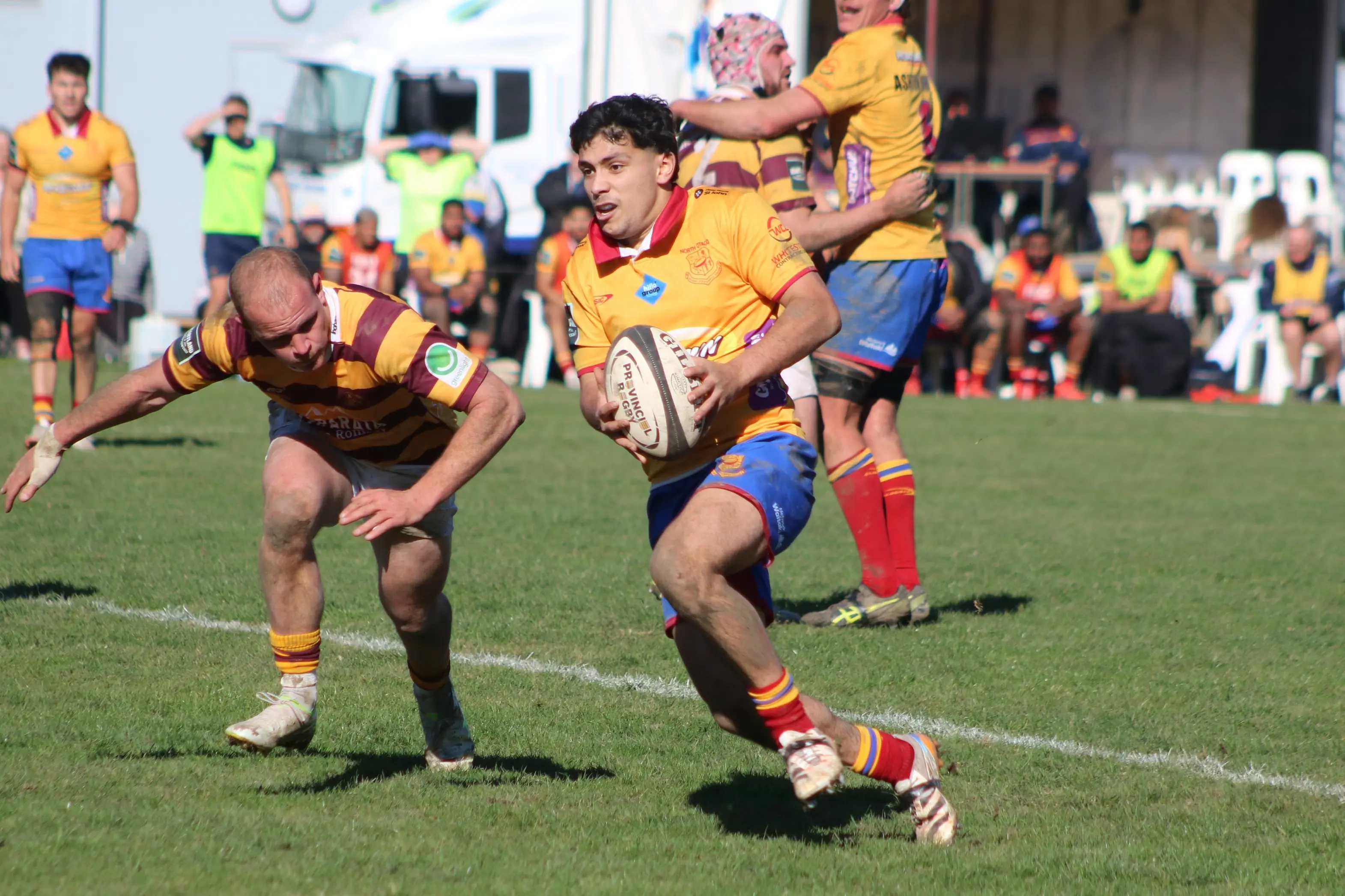 North Otago first five Rico Muliaina evades the tackle of King Country centre Logan Patterson during their Heartland Championship game in Oamaru on Saturday. Photo: Kayla Hodge