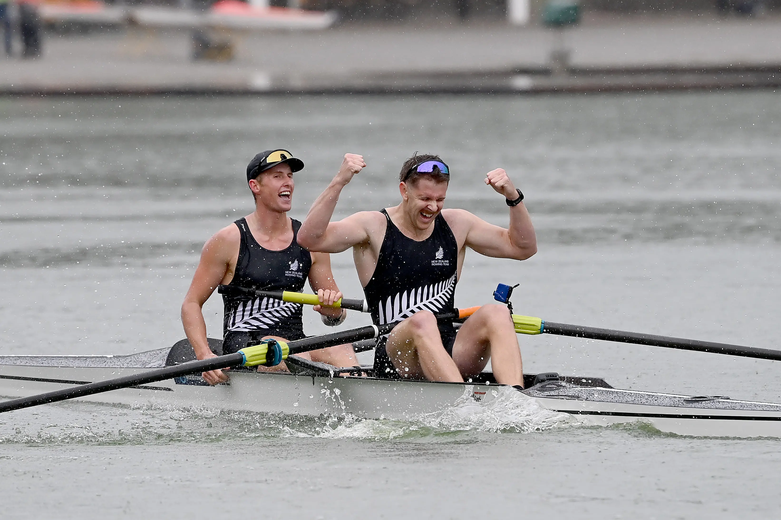 New Zealand rowers Ben Taylor (right) and Oli Welch celebrate gold at the world championships in Amsterdam. Photo: Rowing NZ