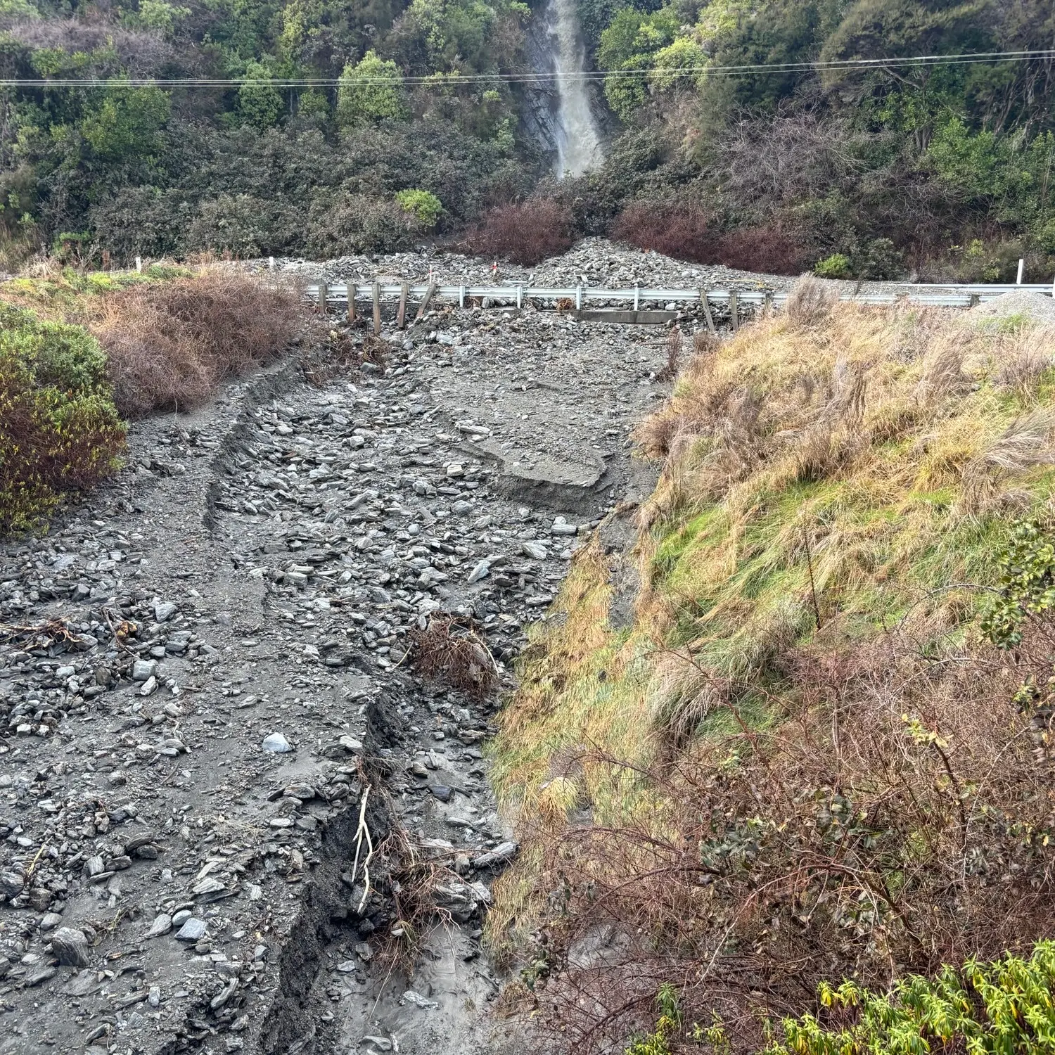Crews working to clear 30 slips on closed section of SH6