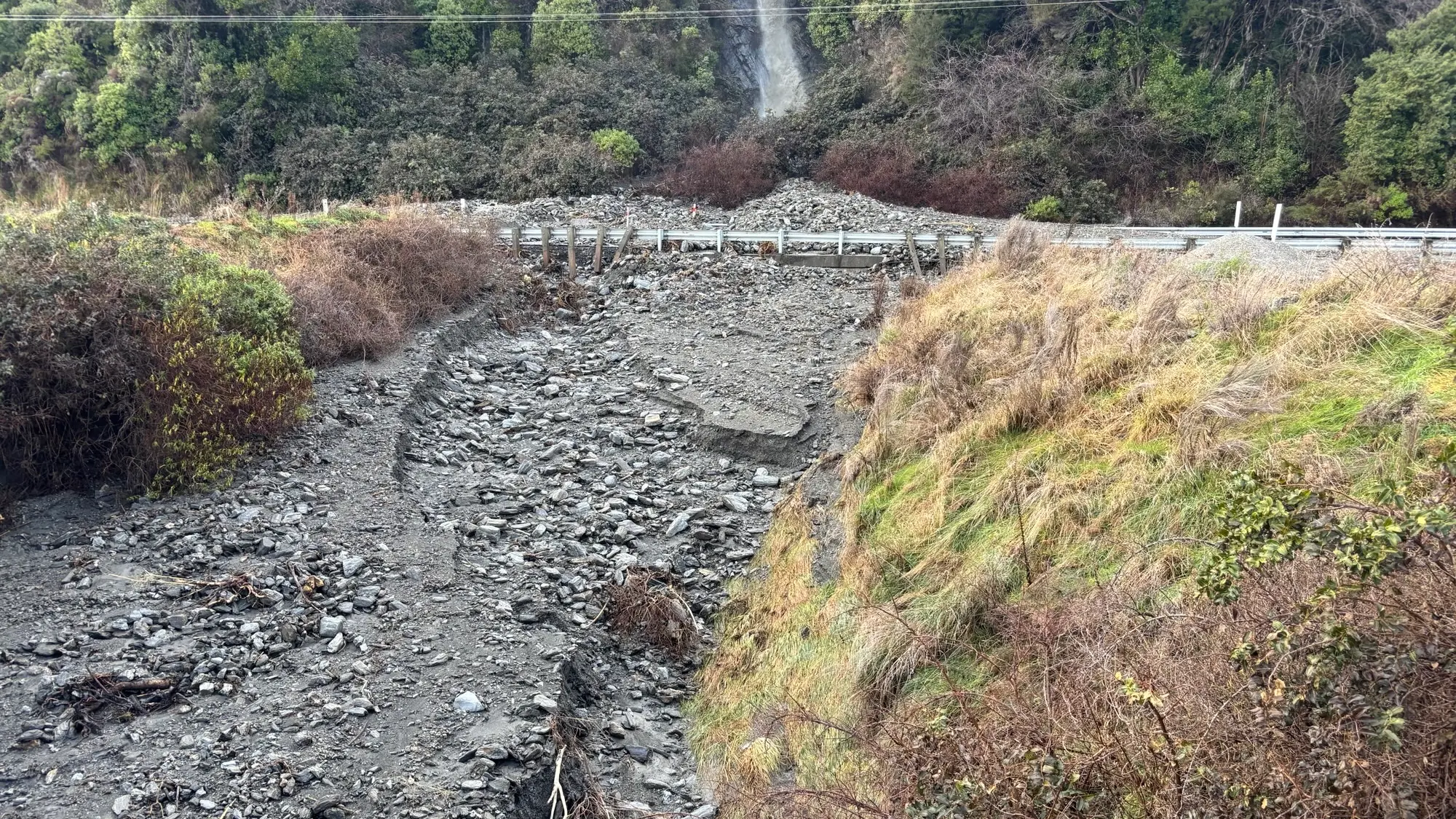 Crews working to clear 30 slips on closed section of SH6