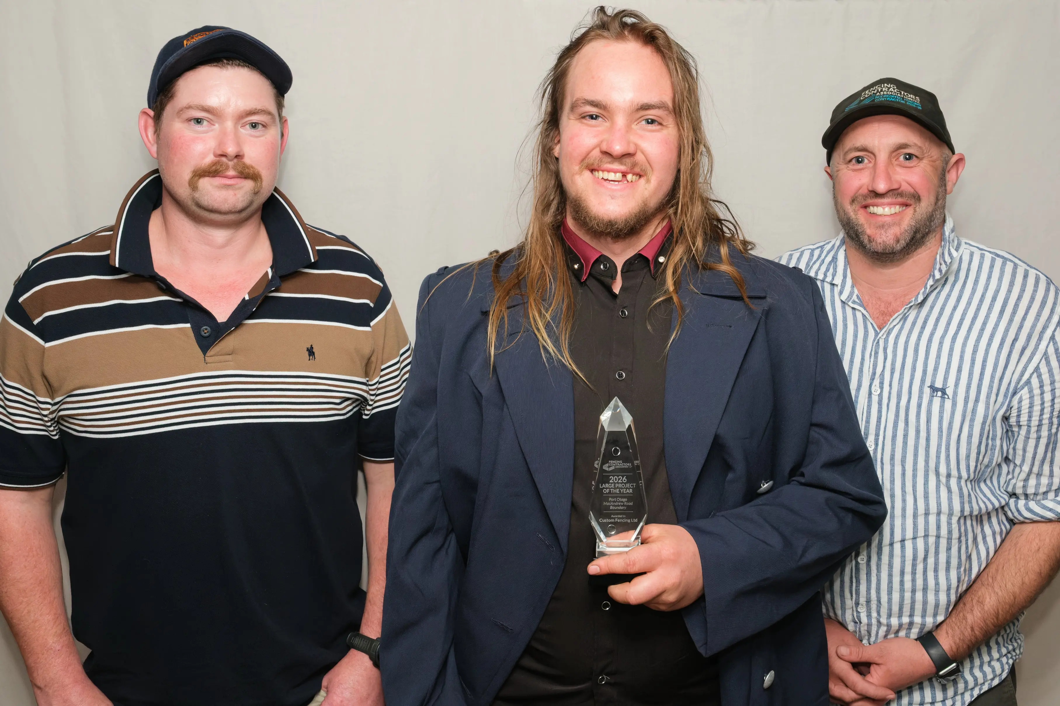 Fencing Industry Awards\\u00A0project of the year winners are (from left) Custom Fencing certified fencers Marcus McKean, Galen Monks and owner Nick Terry. Photo: Supplied