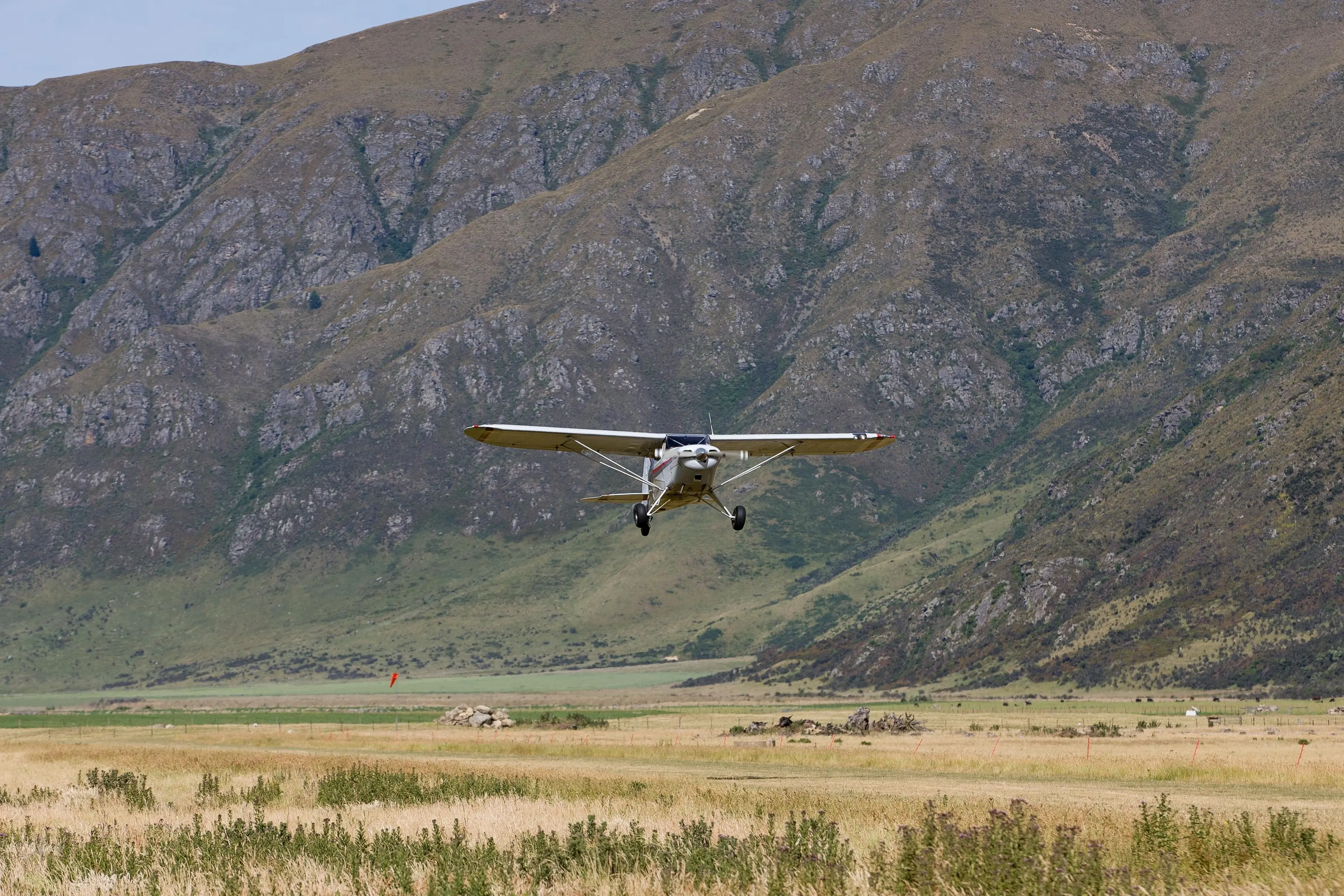 Up in the air: A plane lifts off from the Kingston Station airstrip. Photo: James Allan Photography