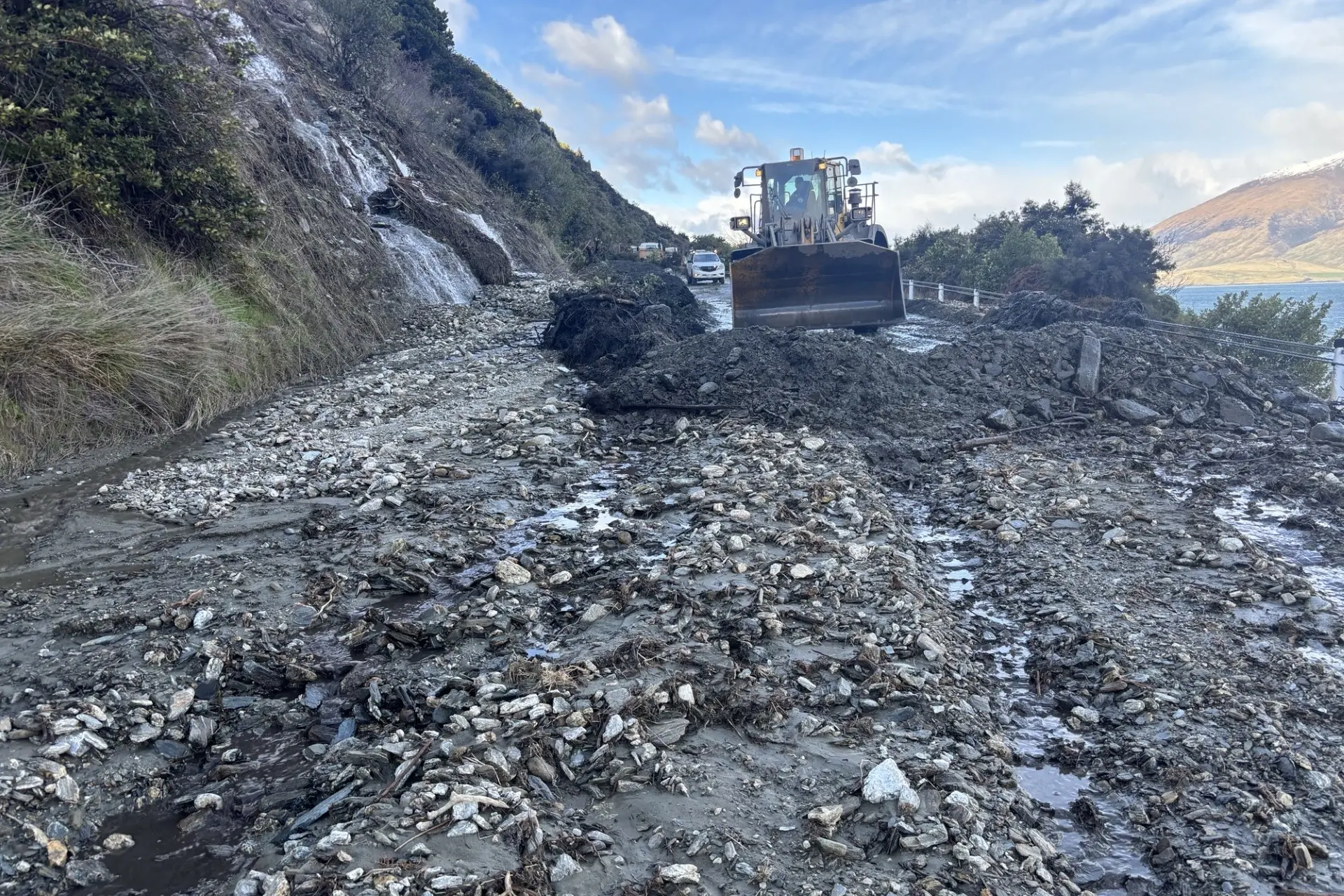 Crews clearing the road on Sunday. Photo: NZTA