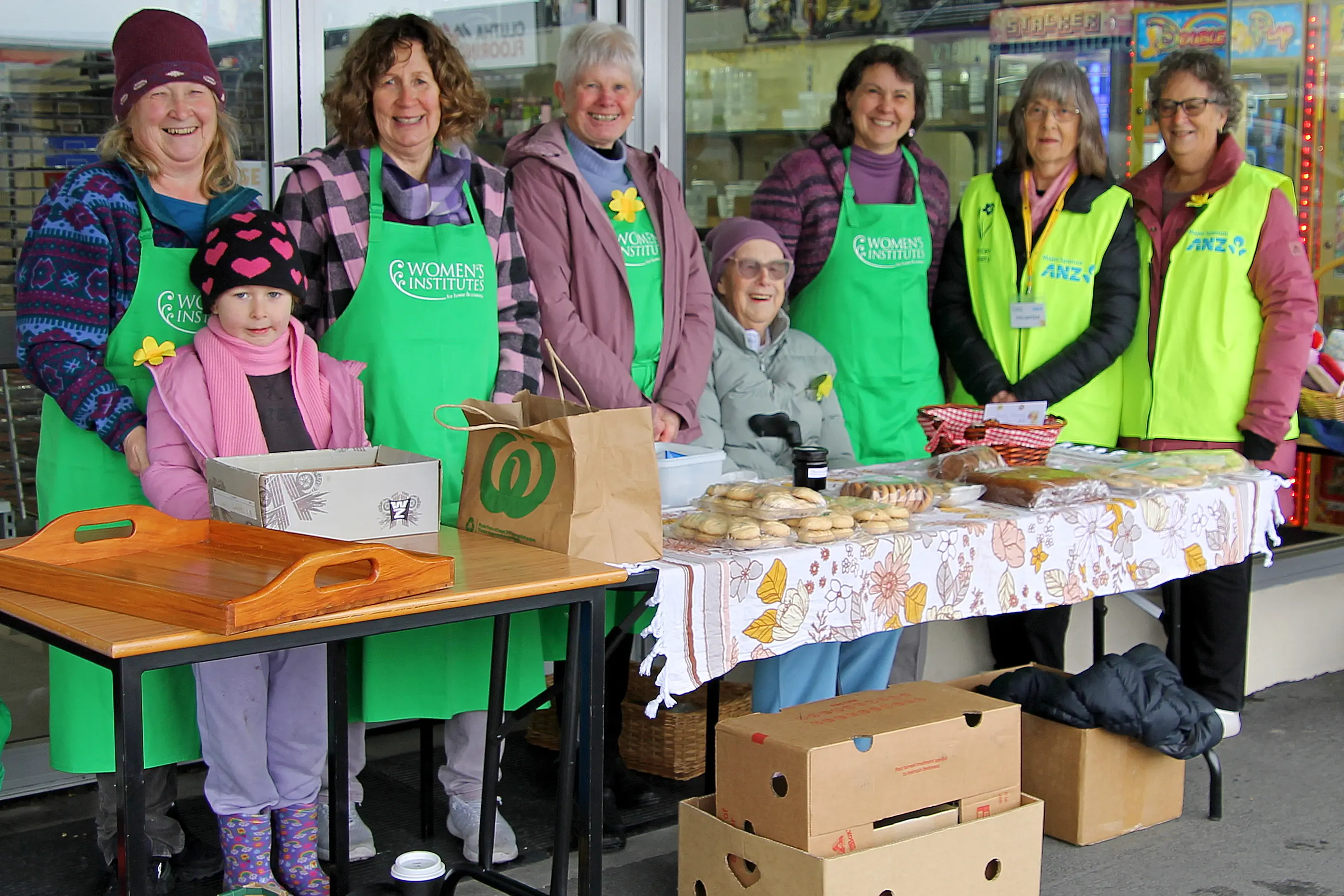 Working at the South Otago Women\\u2019s Institute\\u2019s cake-stall on the corner on Clyde St and John St last Friday were (from left) Heather and Isabelle Ryder, 8, Glenys Roughan, Vicki Galbreath, Ila Ryan, Toni Williams, Jenny Parmenter and Caroline Clark. They raised $1000 for Daffodil Day.