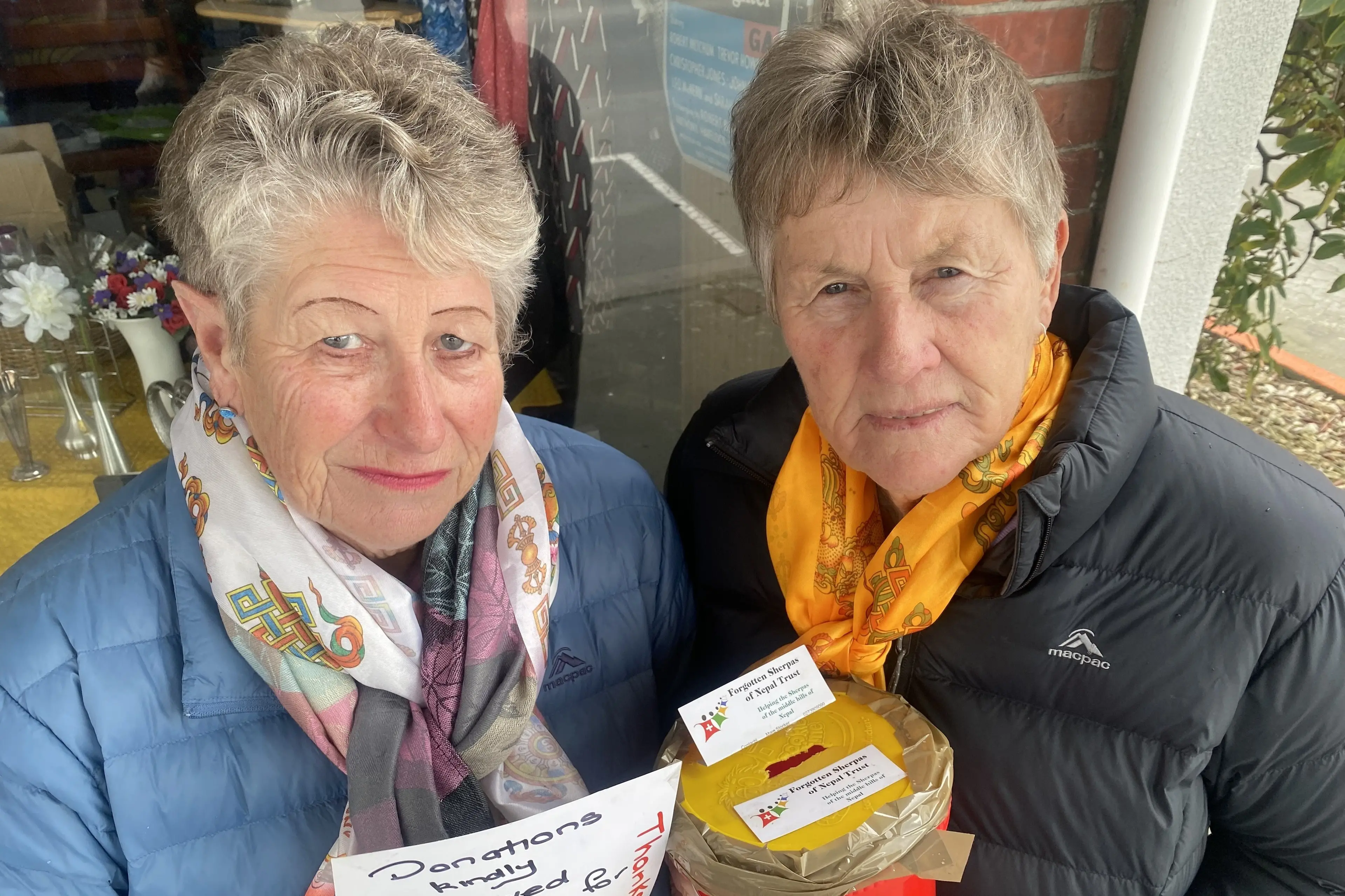 Marg Stocker (left) and Marj Irving are shaking the bucket for a good cause. Photo: Shelley Inon