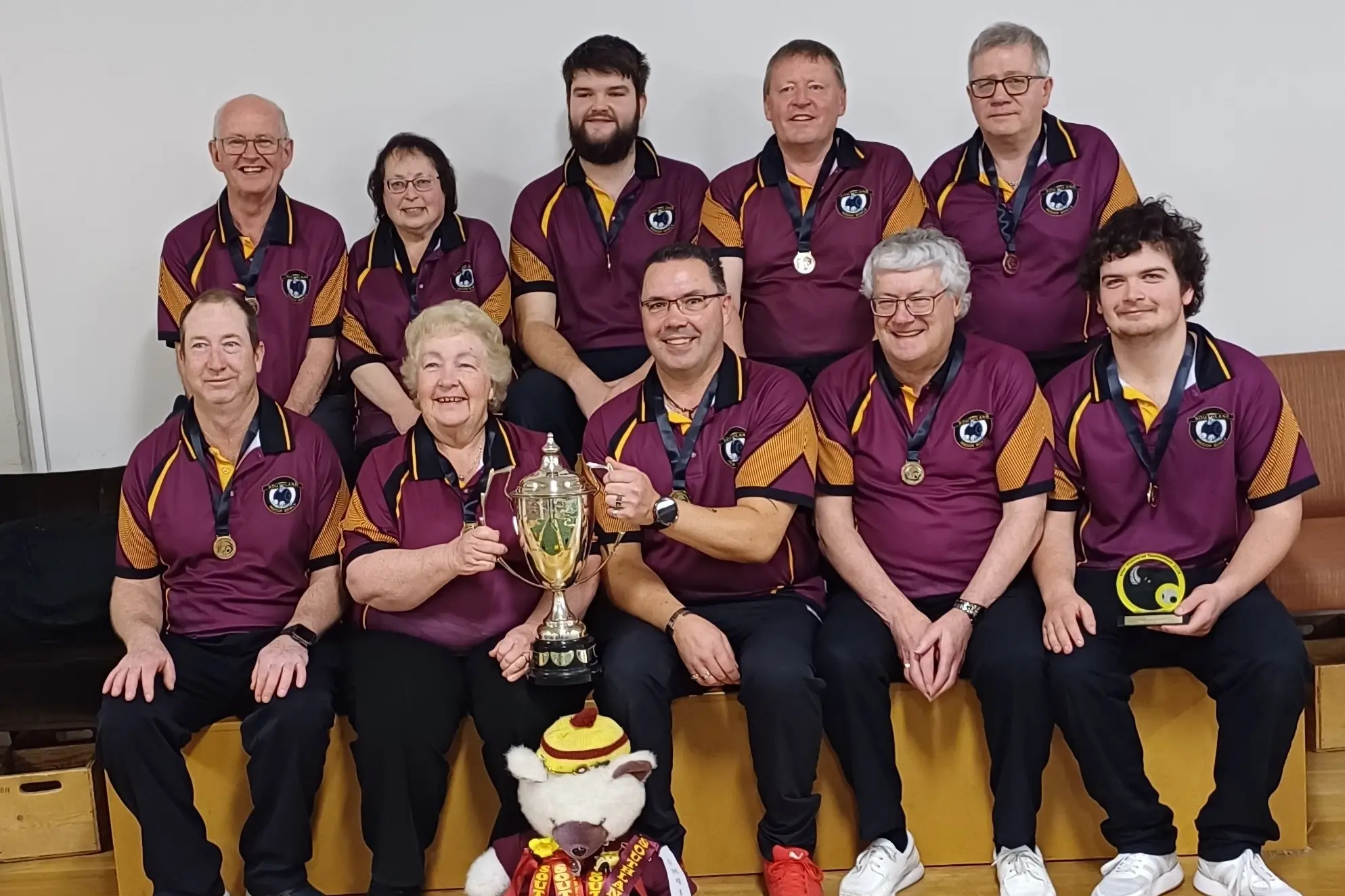 Southland Indoor bowlers (back row, from left) Brian Hotton, Suzanne Mackie, Matthew Tosh, Kelvin Moylan and Warwick Gray, (front row, from left) John Perry, Jan Low, Gary Low, Graham Low and Shawn Perry celebrate winning the National Interprovincial Indoor Bowls Championship division two tournament in Christchurch at the weekend. Photo: Supplied