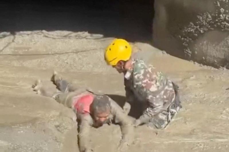 Nepal teams seek hundreds trapped in hydropower tunnels after deadly floods