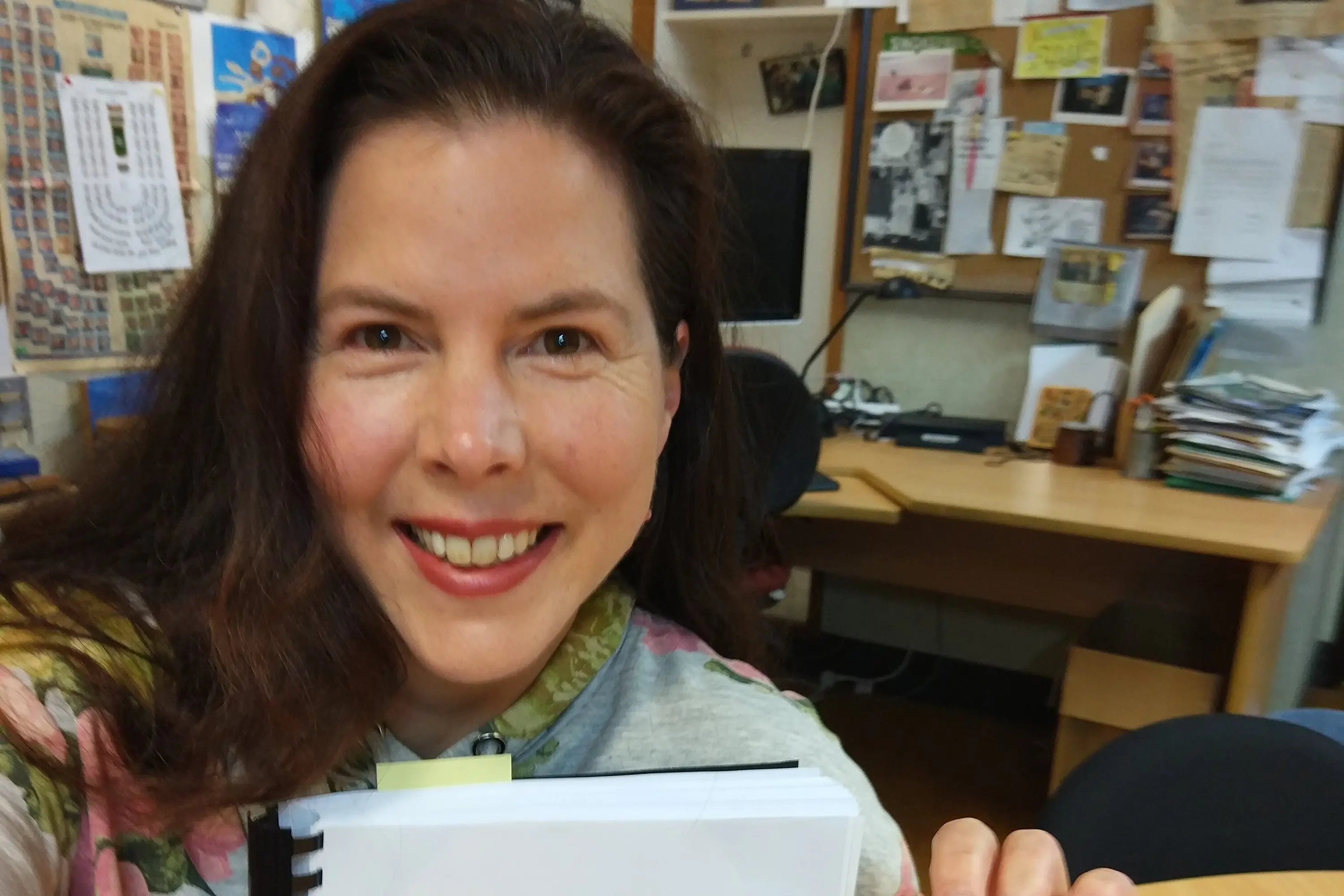 University of Otago (Christchurch) Faculty of Medicine senior research fellow Dr Jude Ball with her PhD thesis which won a chocolate fish back in 2019 when she submitted it, and now it has won an international award for its inclusion in an article published in the Journal of Sex Research. Photo: Supplied