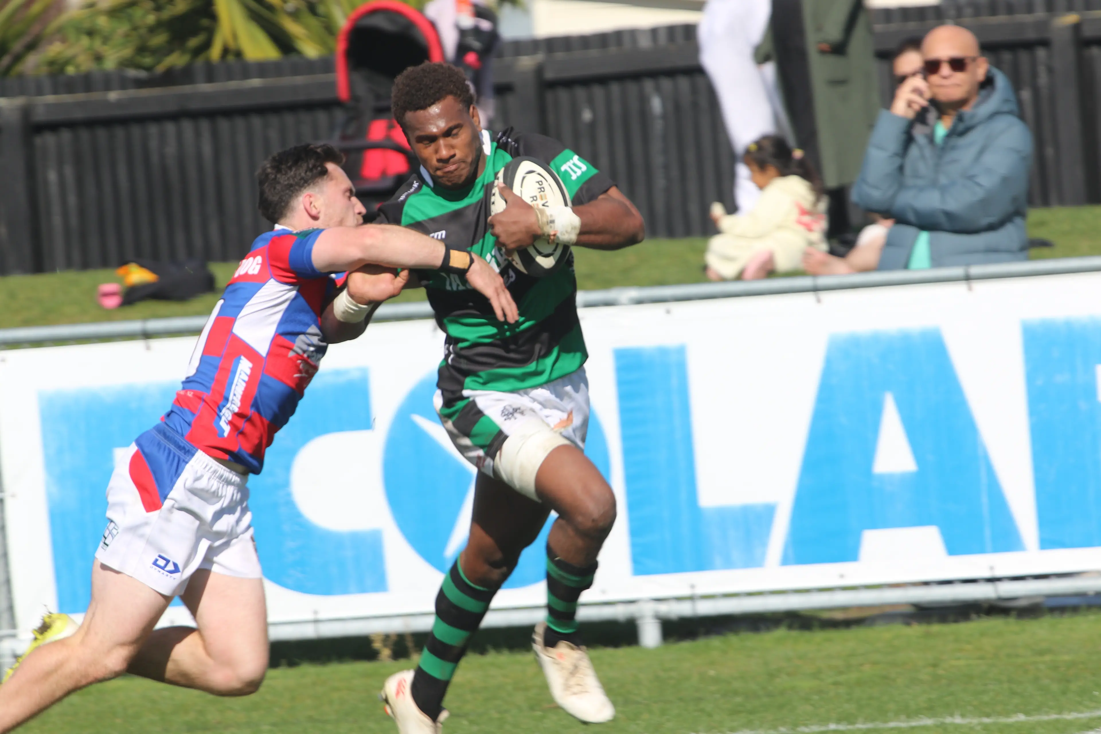 Hat trick hero Sireli Masi shakes off a Buller player. Photo: Stu Piddington