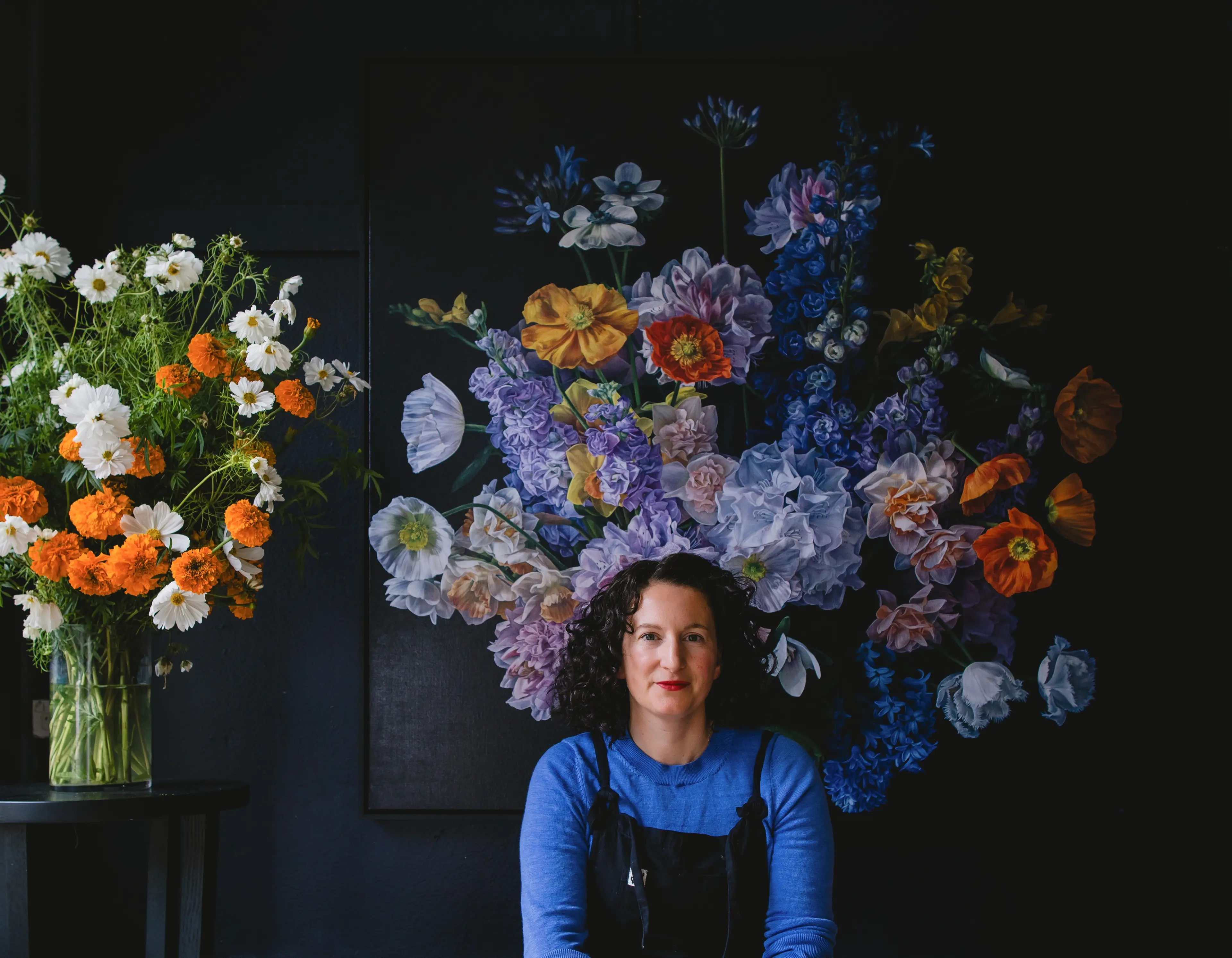 Dunedin artist Julie Battisti with one of her works. Photo: Supplied