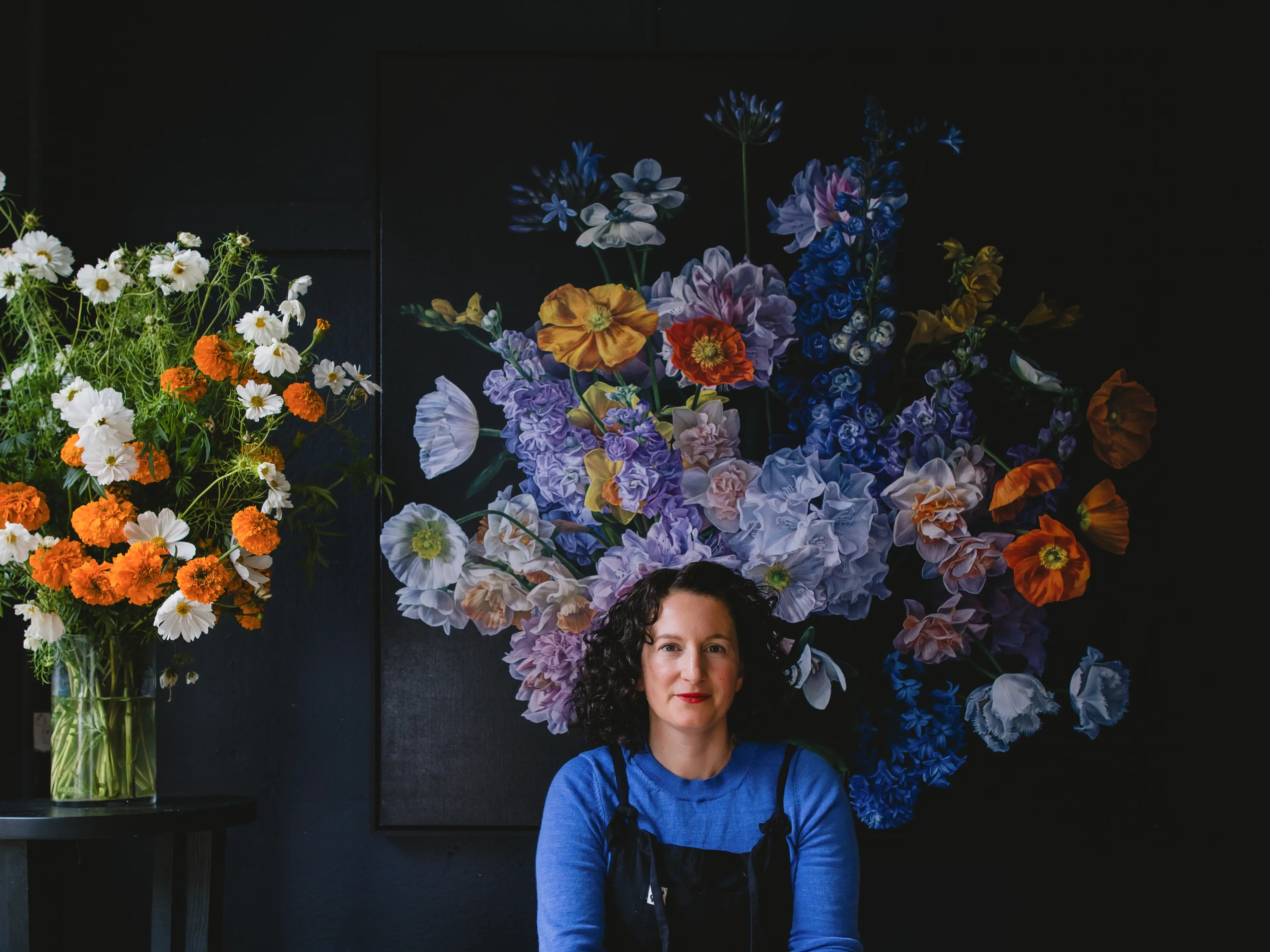 Dunedin artist Julie Battisti with one of her works. Photo: Supplied