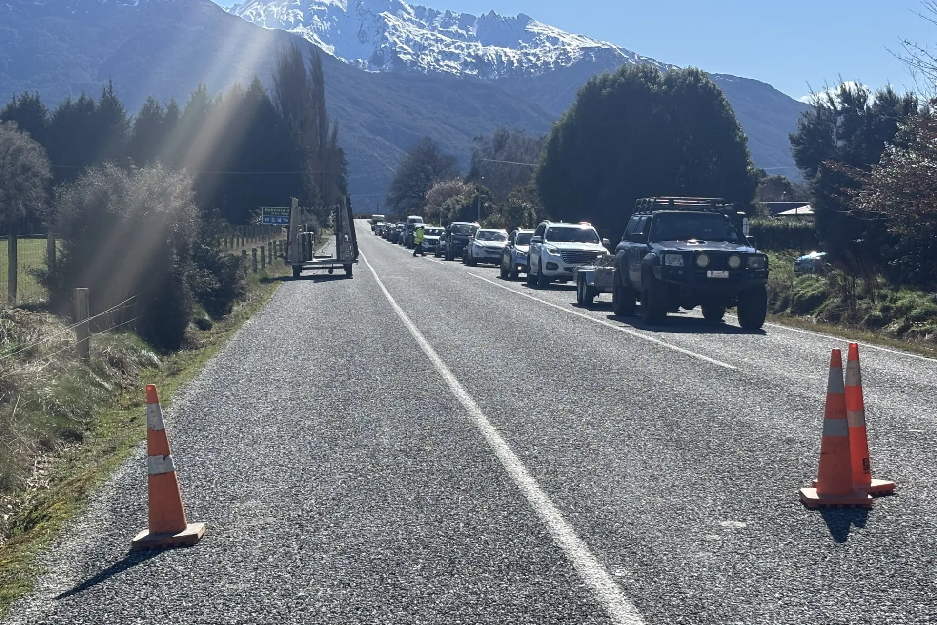 Vehicles queued up for one of the SH6 escorted convoys on Tuesday from Makarora. Photo: NZTA
