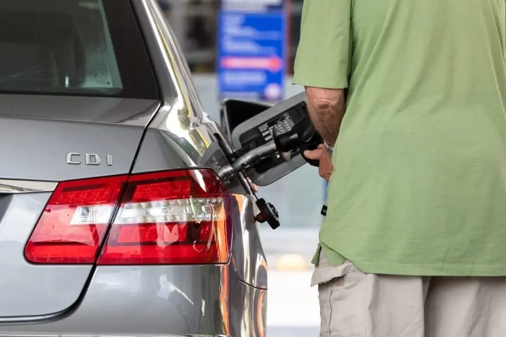 Filling up and paying fuel taxes. Photo: RNZ