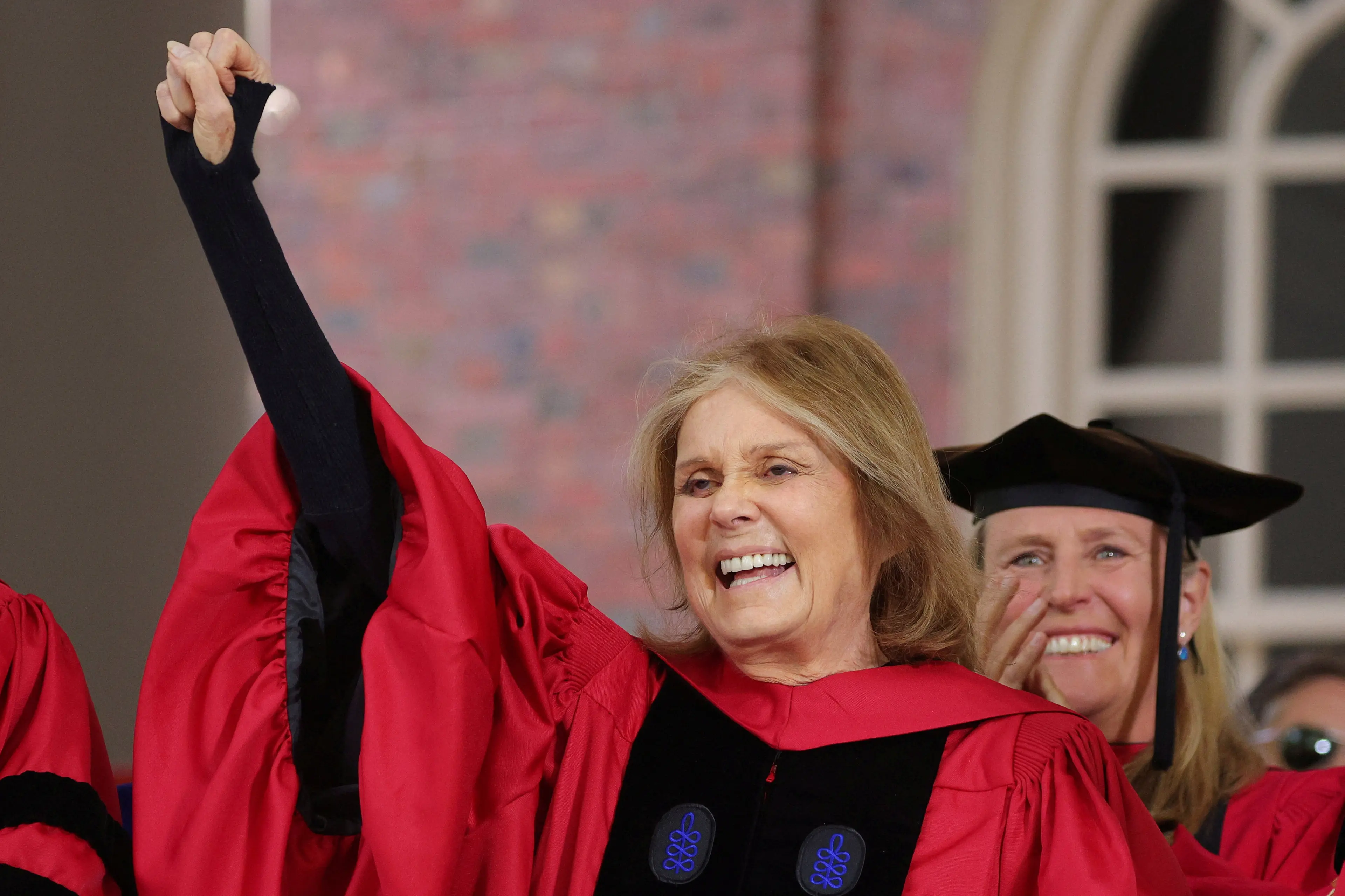 Gloria Steinem salutes the graduating students as she receives and honorary Doctor of Humane Letters at Harvard University. File photo: Reuters