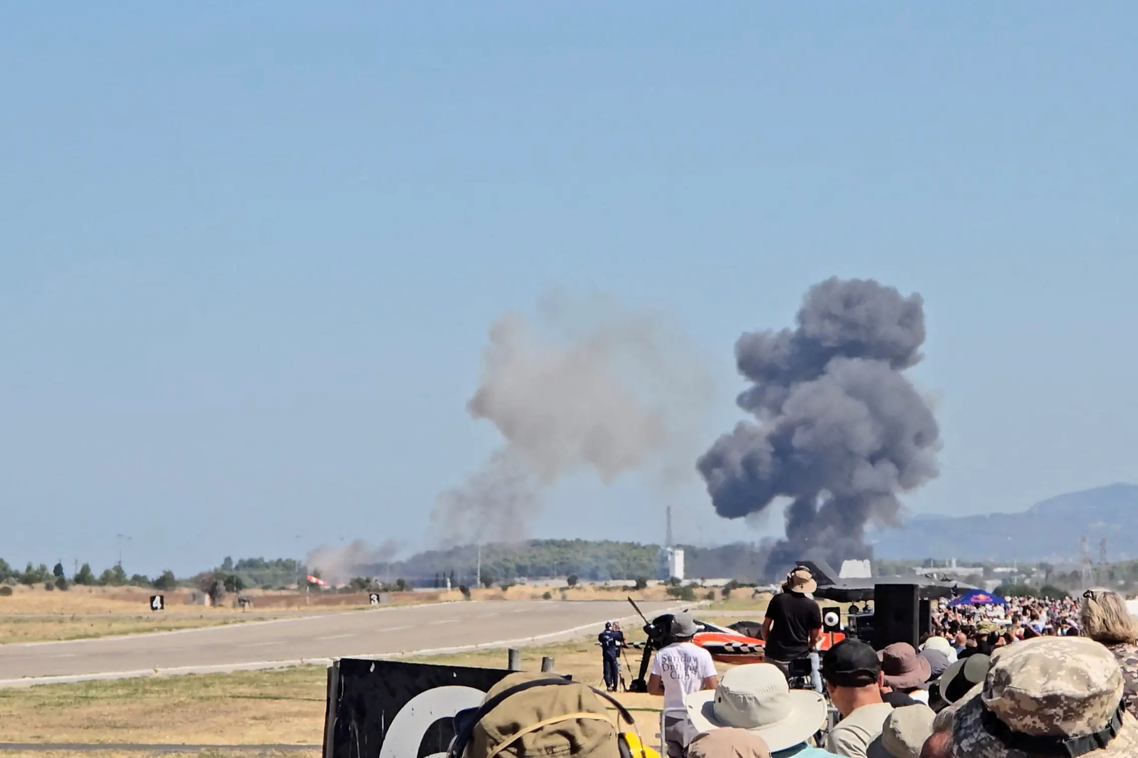 Smoke rises after the fighter jet crash at Tanagra air base north of Athens. Photo: @sovva1_1 via X/via REUTERS