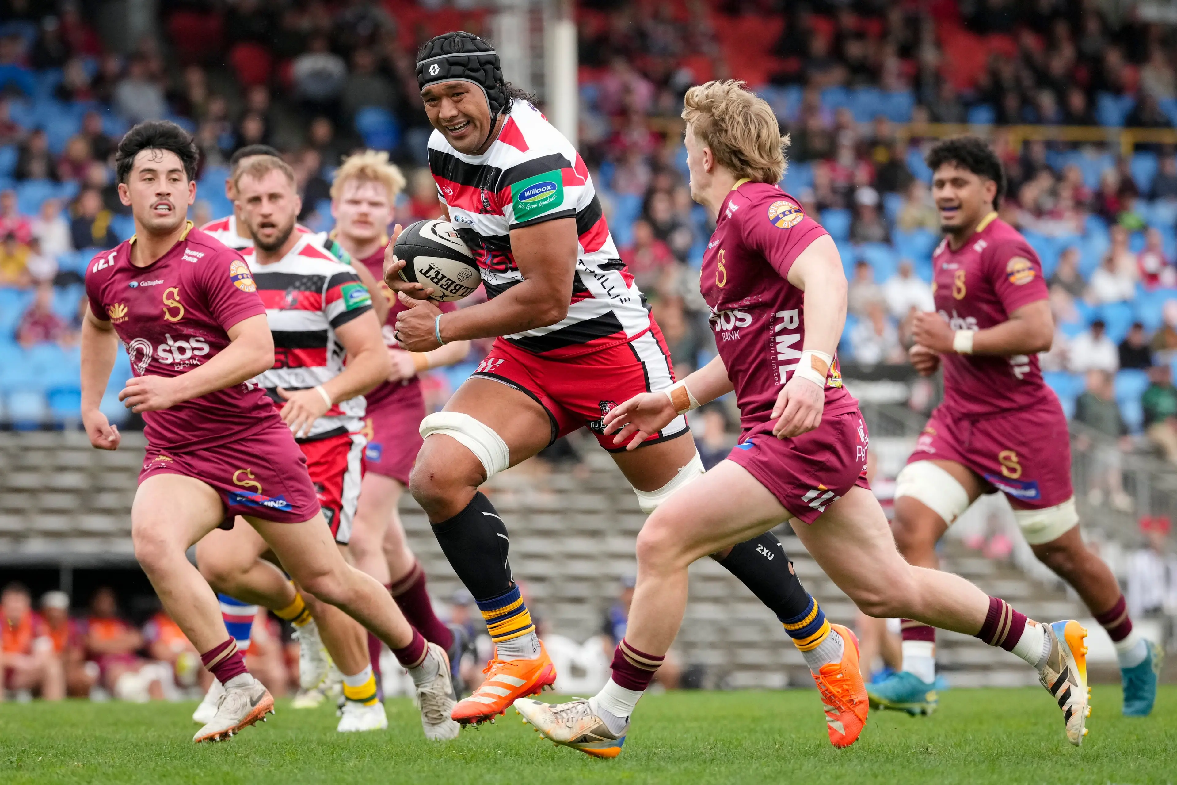 Counties-Manukau lock Veikoso Poloniati looks for space past Southland defenders Nic Shearer (left) and Jimmy Taylor during the NPC game in Pukekohe on Sunday. Photo: NZ Rugby/Smartframe
