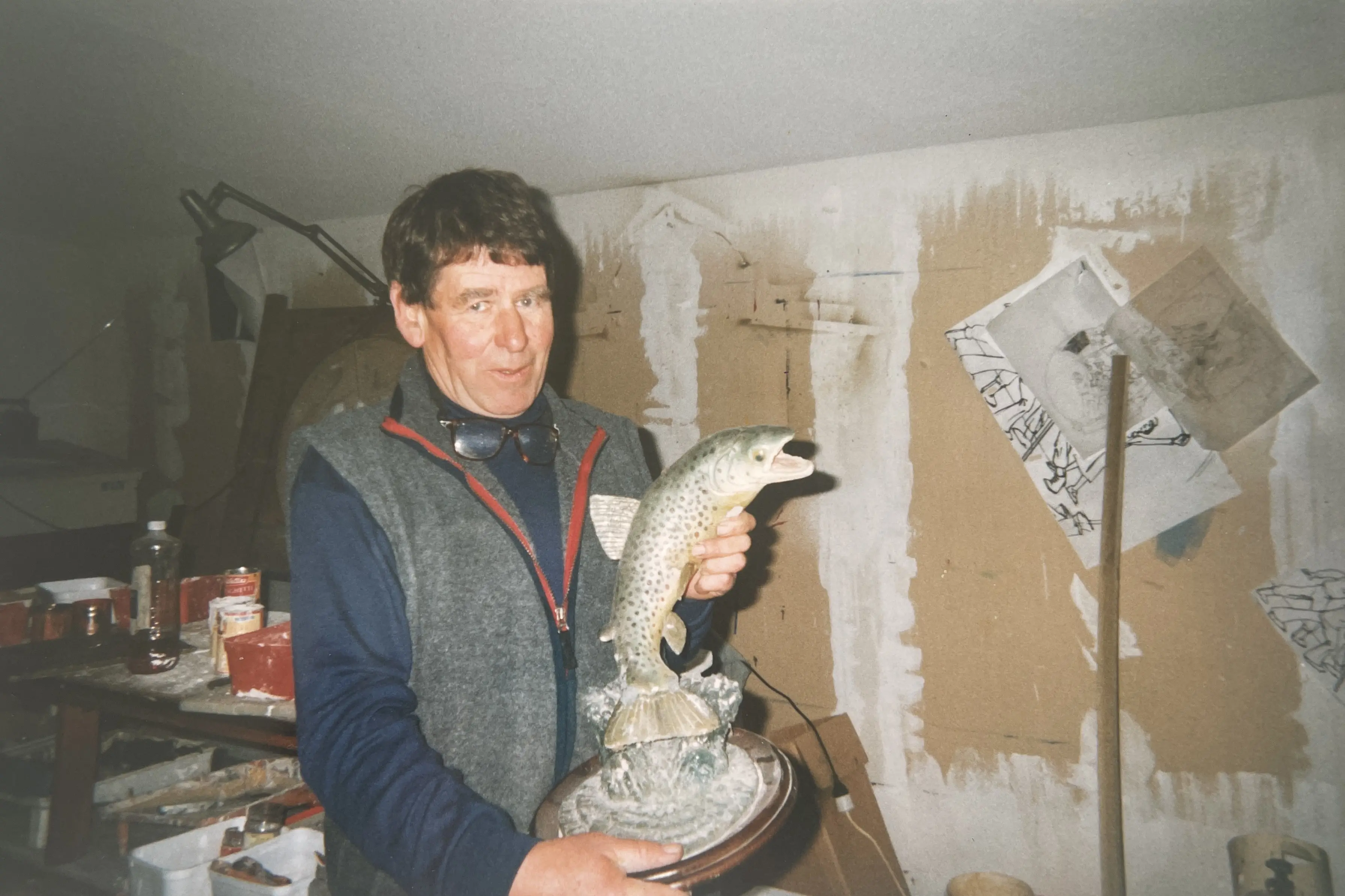 Gore artist Errol Allison holds a prototype of the Gore trout monument, in the 1980s, which has stood in Main St for close to 40 years. Photo: Supplied
