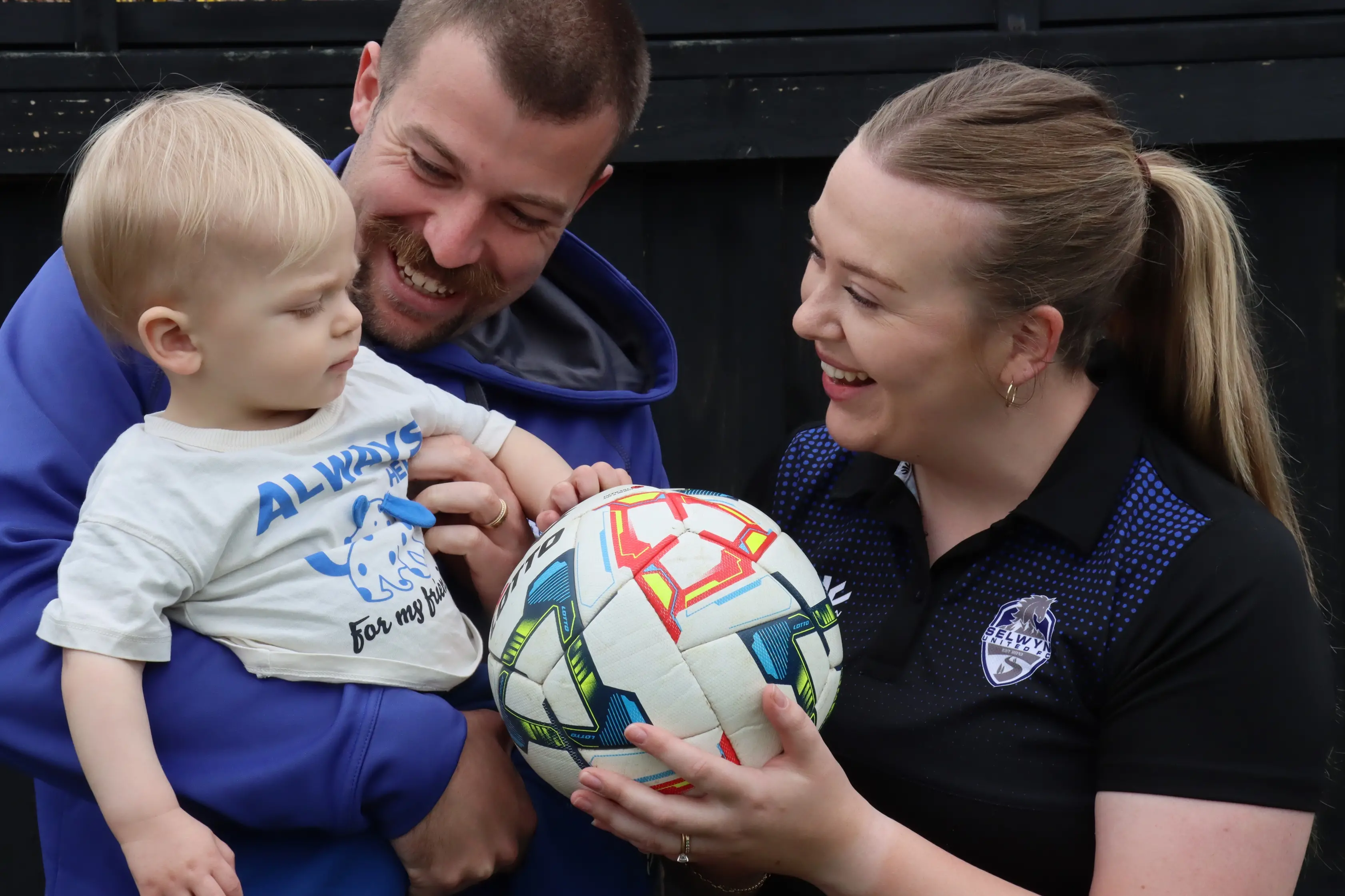 Alex Smith, right, with husband Hamish and son Cooper. Alex and Hamish are both heavily involved in Selwyn United, as president and player respectively. PHOTO: SAM COUGHLAN