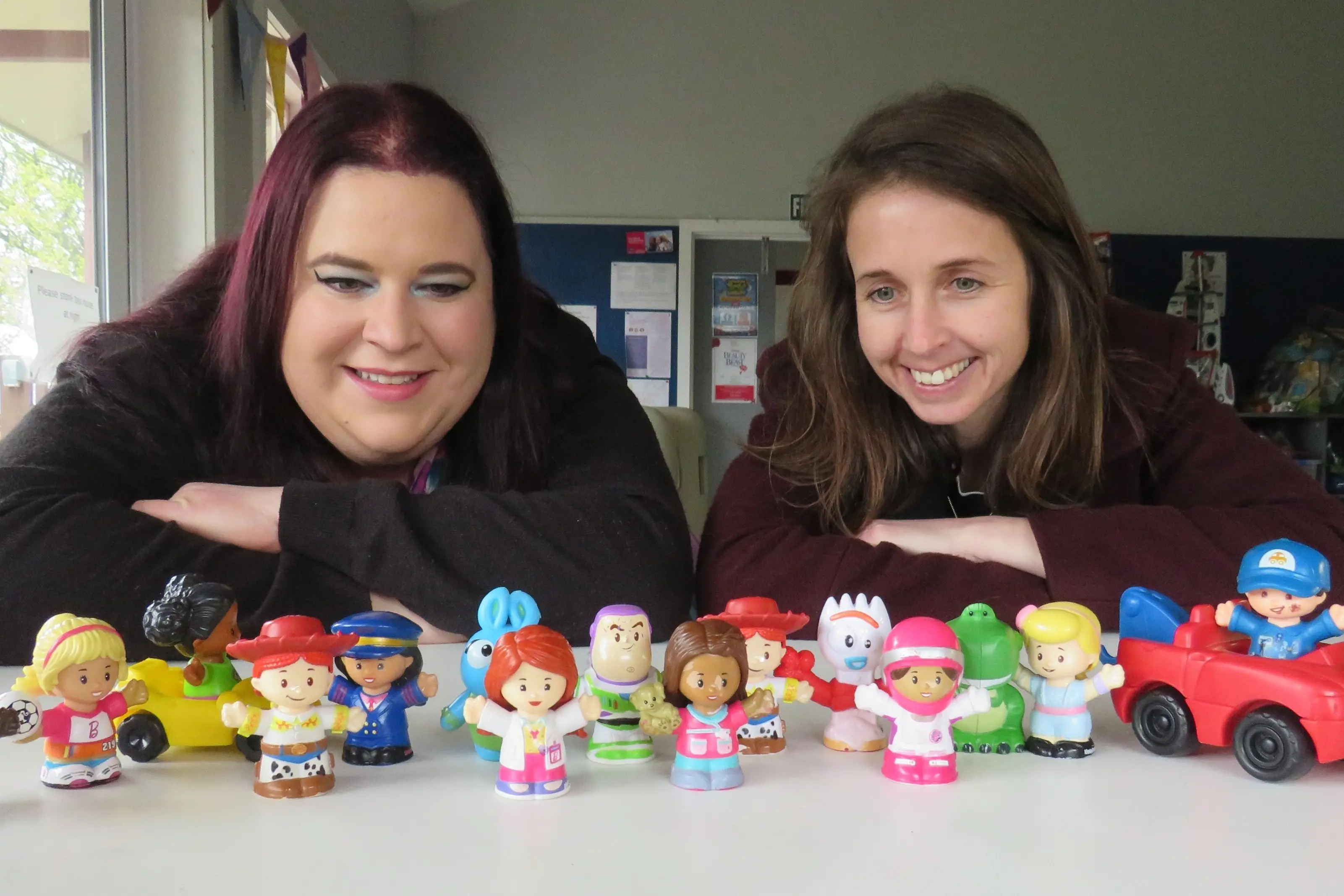 Ashburton Toy Library committee members Jess Wright (left) and Alanna Hollier check out the Fisher Price Little People that may be hiding around Ashburton\\'s CBD. Photos: Dellwyn Moylan