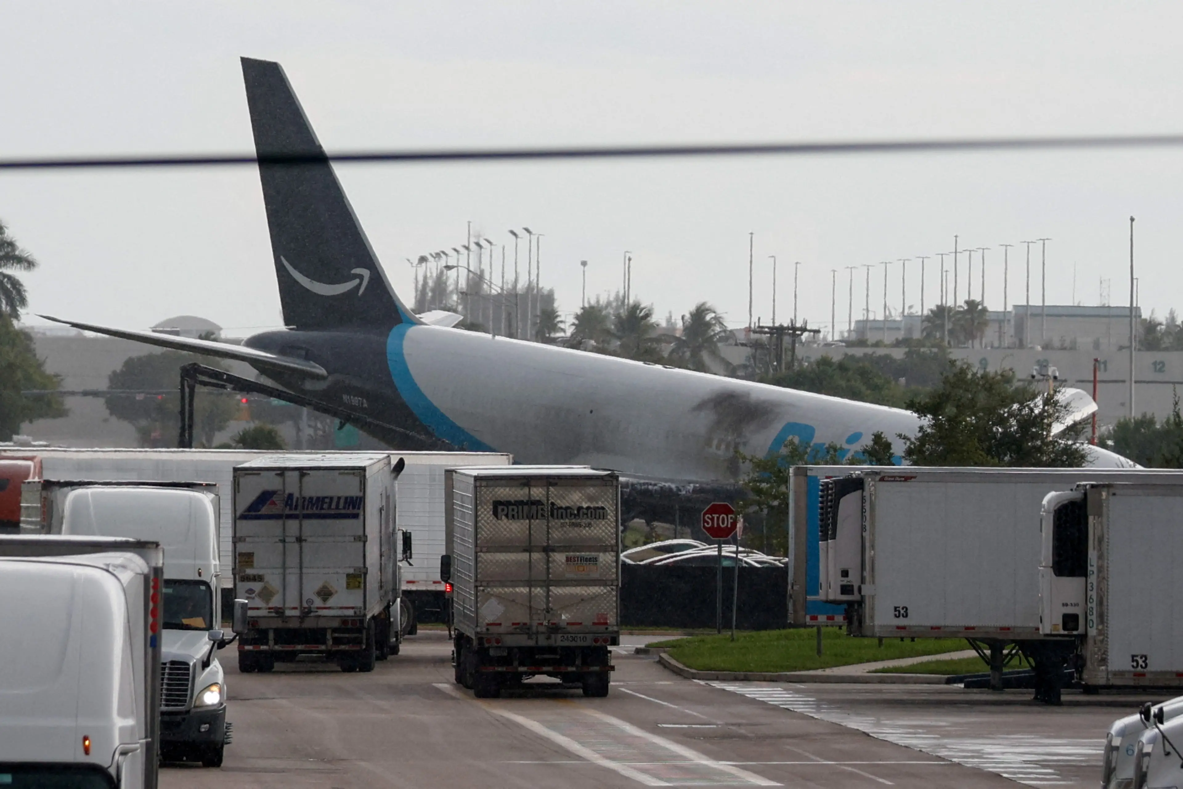 <p>A view of an Amazon Prime Air cargo plane that airport officials said overran a runway at Miami International Airport, in Miami, Florida. Photo: Reuters</p>\\n