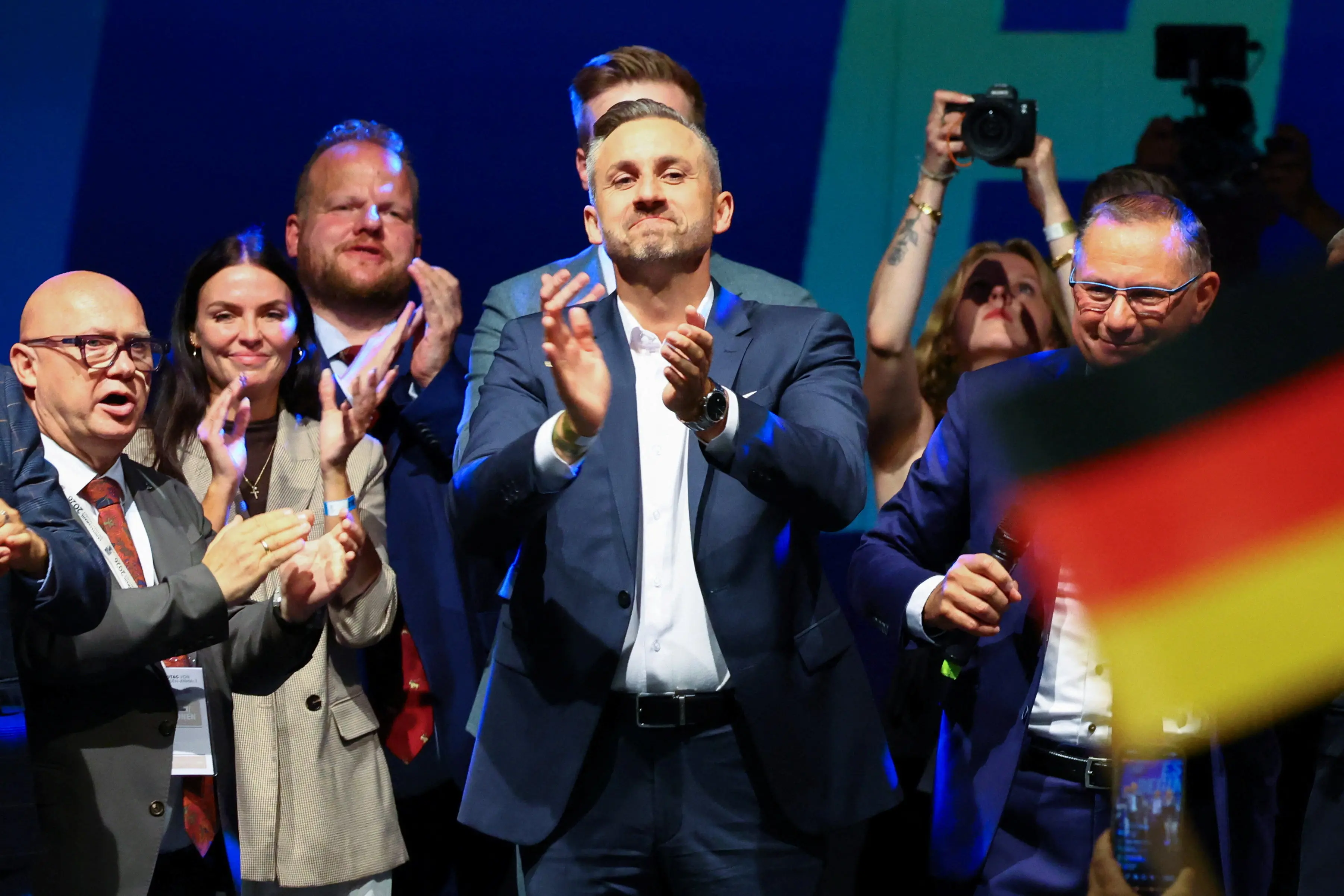 Top candidate of the far-right Alternative for Germany (AfD) Ulrich Siegmund applauds onstage at the AfD election party after polls closed in the Saxony-Anhalt state elections and exit polls were announced, in Magdeburg, Germany. REUTERS/Fabrizio Bensch