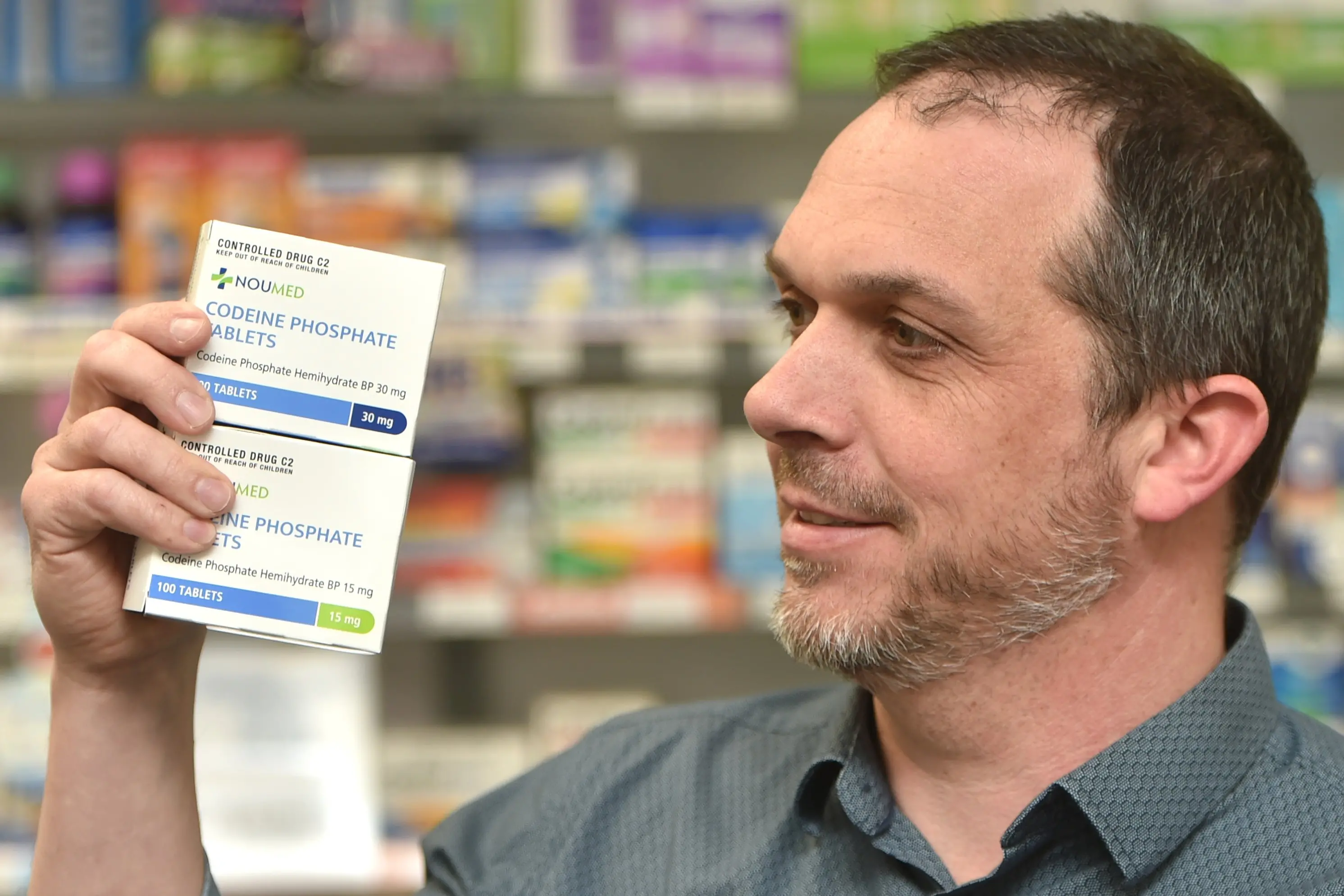 Albany St Pharmacy pharmacist Greg Andrews with codeine medication Pharmac has warned is in short supply due to the recent heatwave in the United Kingdom. Photo: Gregor Richardson