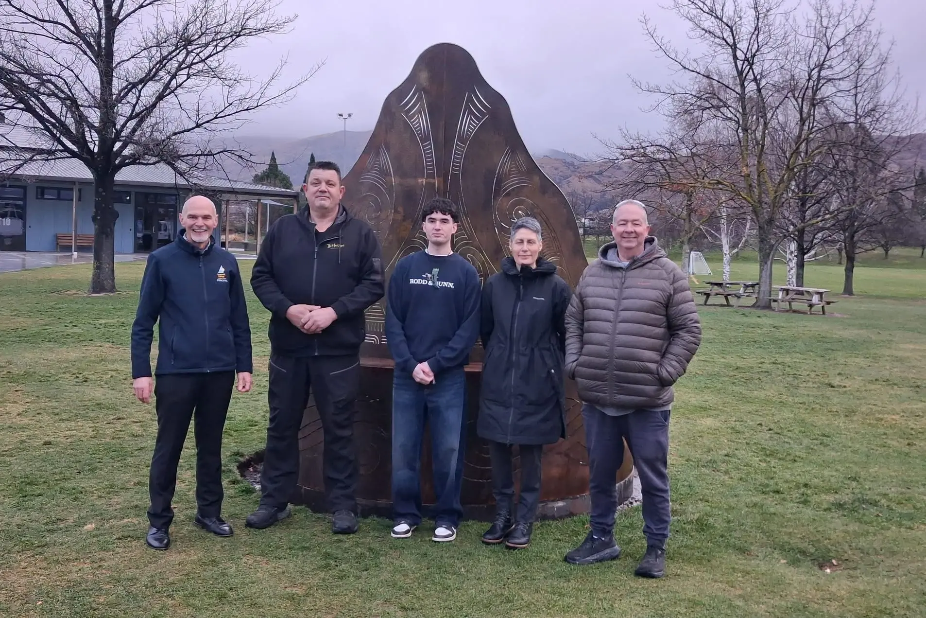 At the unveiling of Cromwell College\\'s new Pou Whenua are (from left) principal Mason Stretch, Nigel Longman, Hadley, Thea and Steve Farquharson. Photo: Supplied