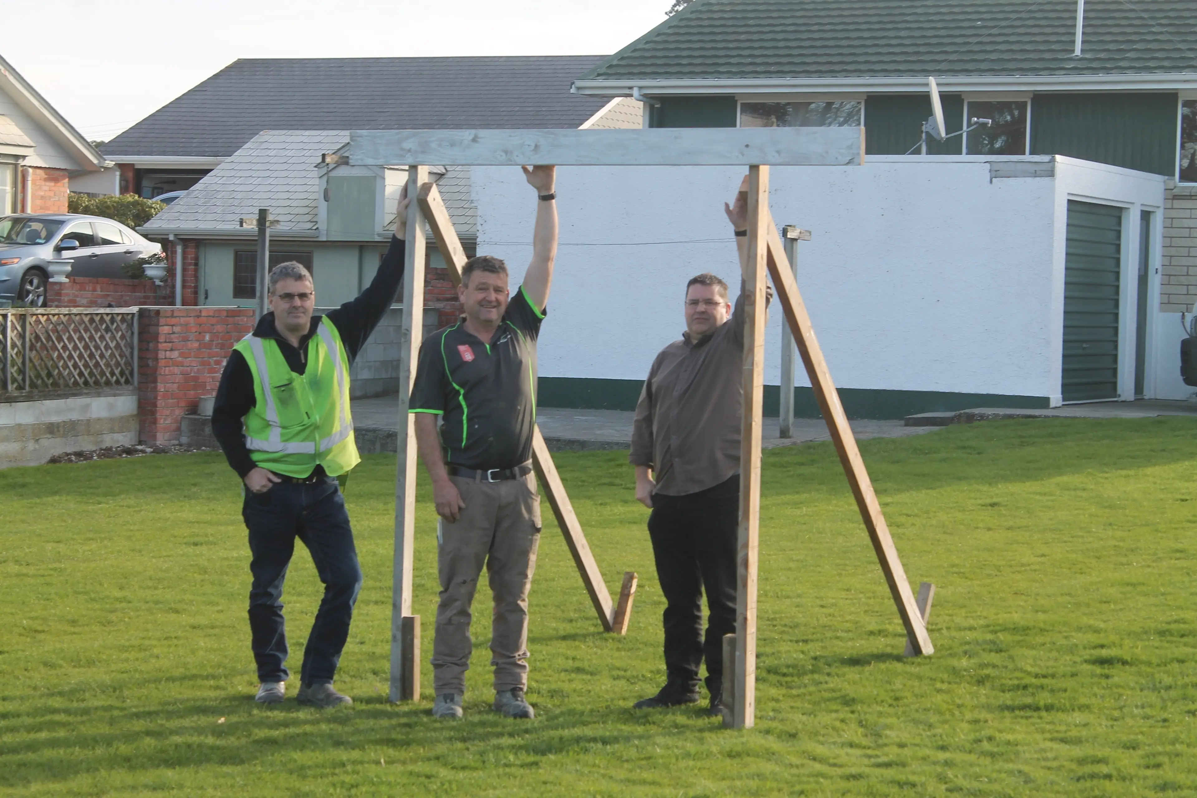 Looking at the new floor level needed for a house in Ardwick St in Gore are (from left) house owner Matt King, builder Aaron Stevenson and architectural designer Phil Checketts. Photo: Gerrit Doppenberg