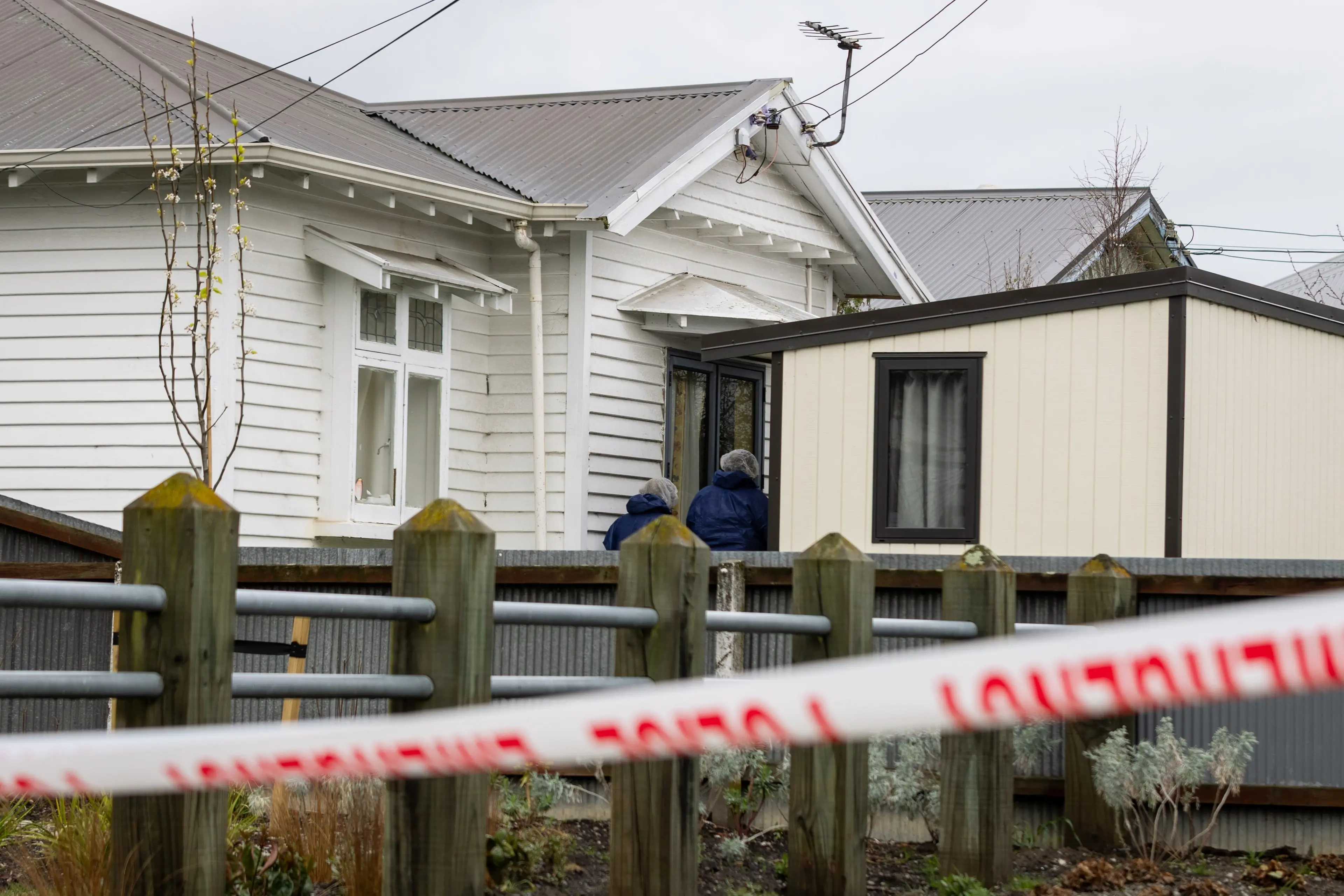 Police at the scene of the sudden death on Milton Rd on September 7. Photo: Nathan McKinnon / RNZ
