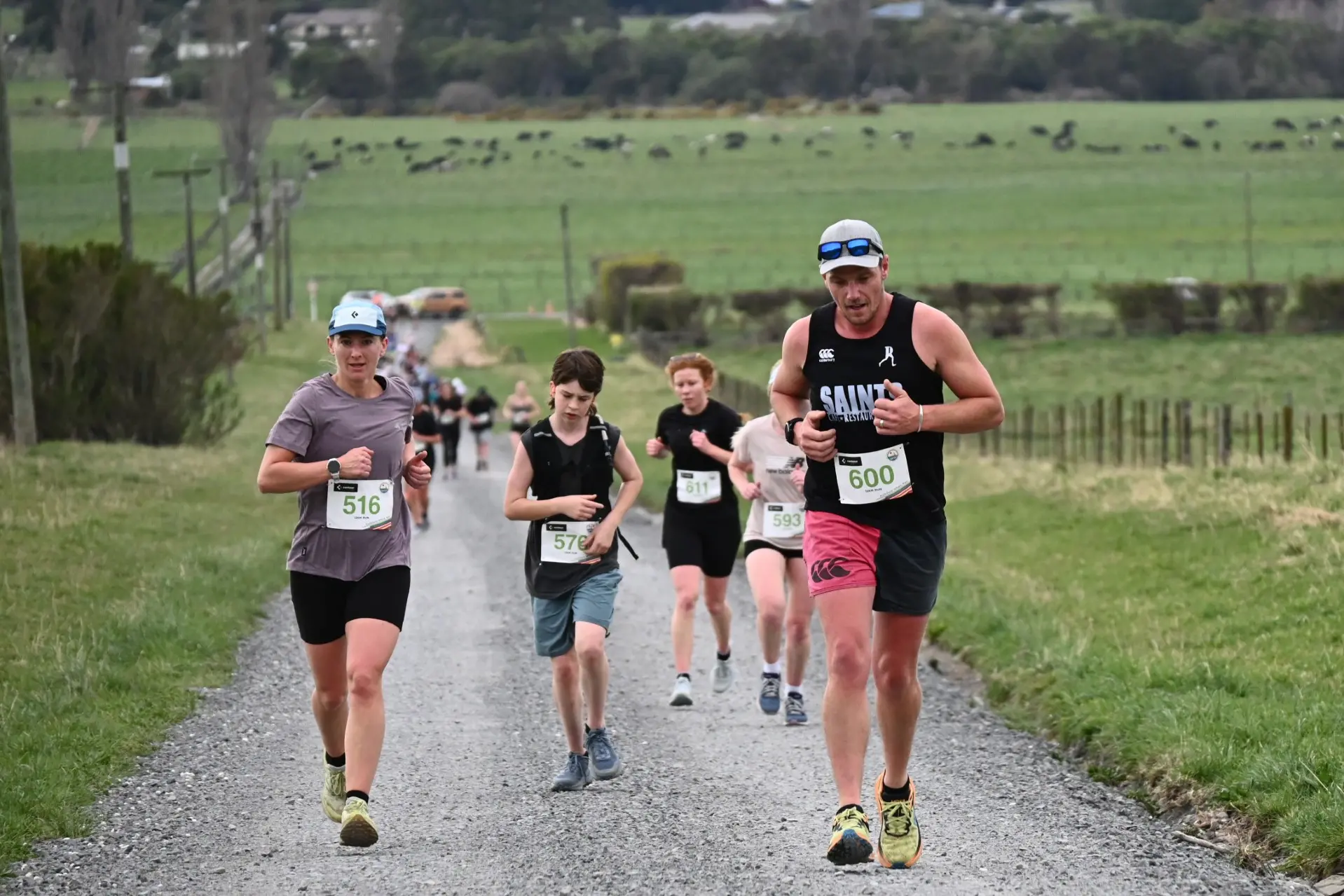 Mixed ages . . . A group taking part in the 12km run tackling a steeper part of the course. Photo: Biddy Getz